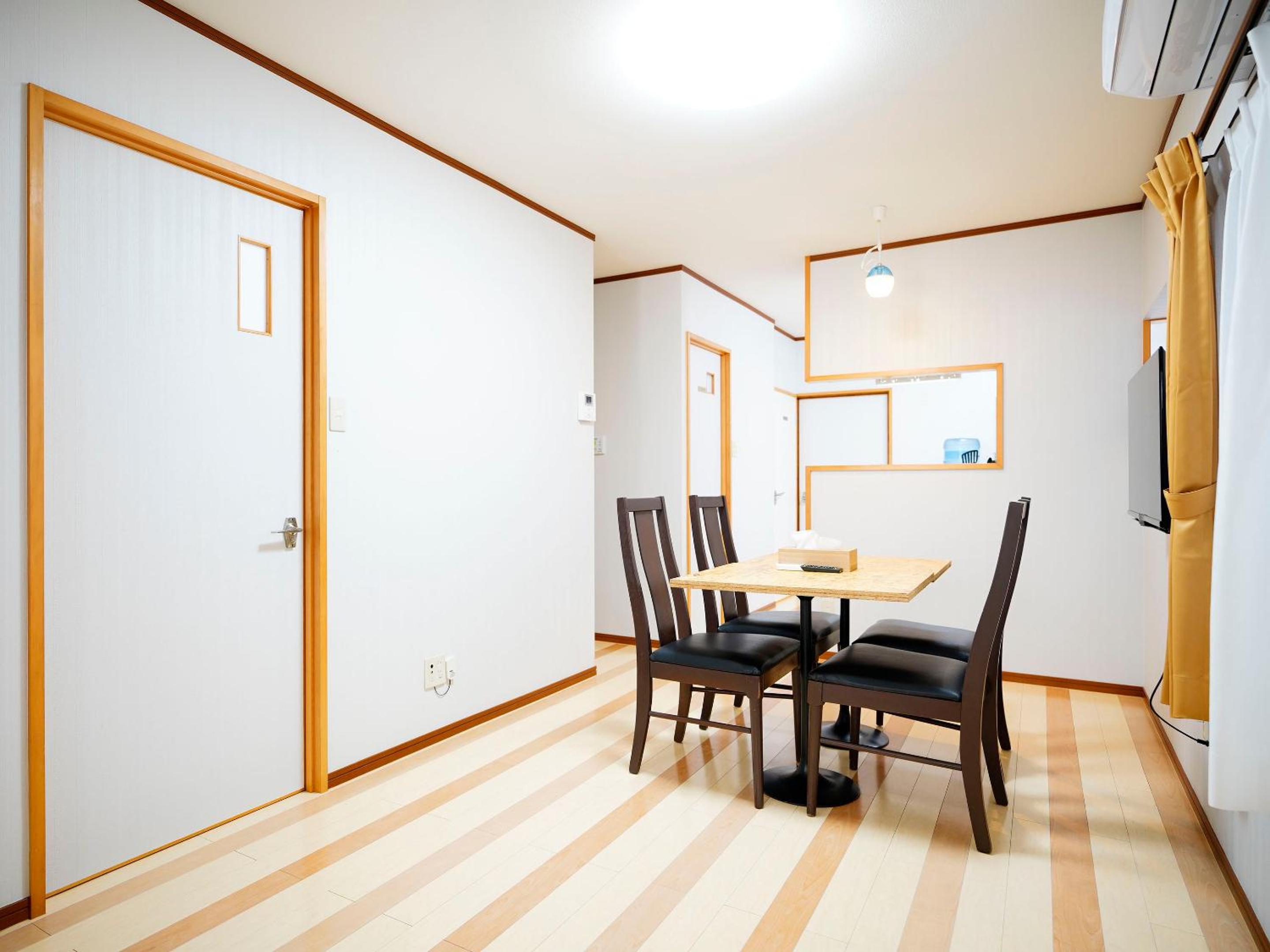 Three-Bedroom Apartment - Photo 4