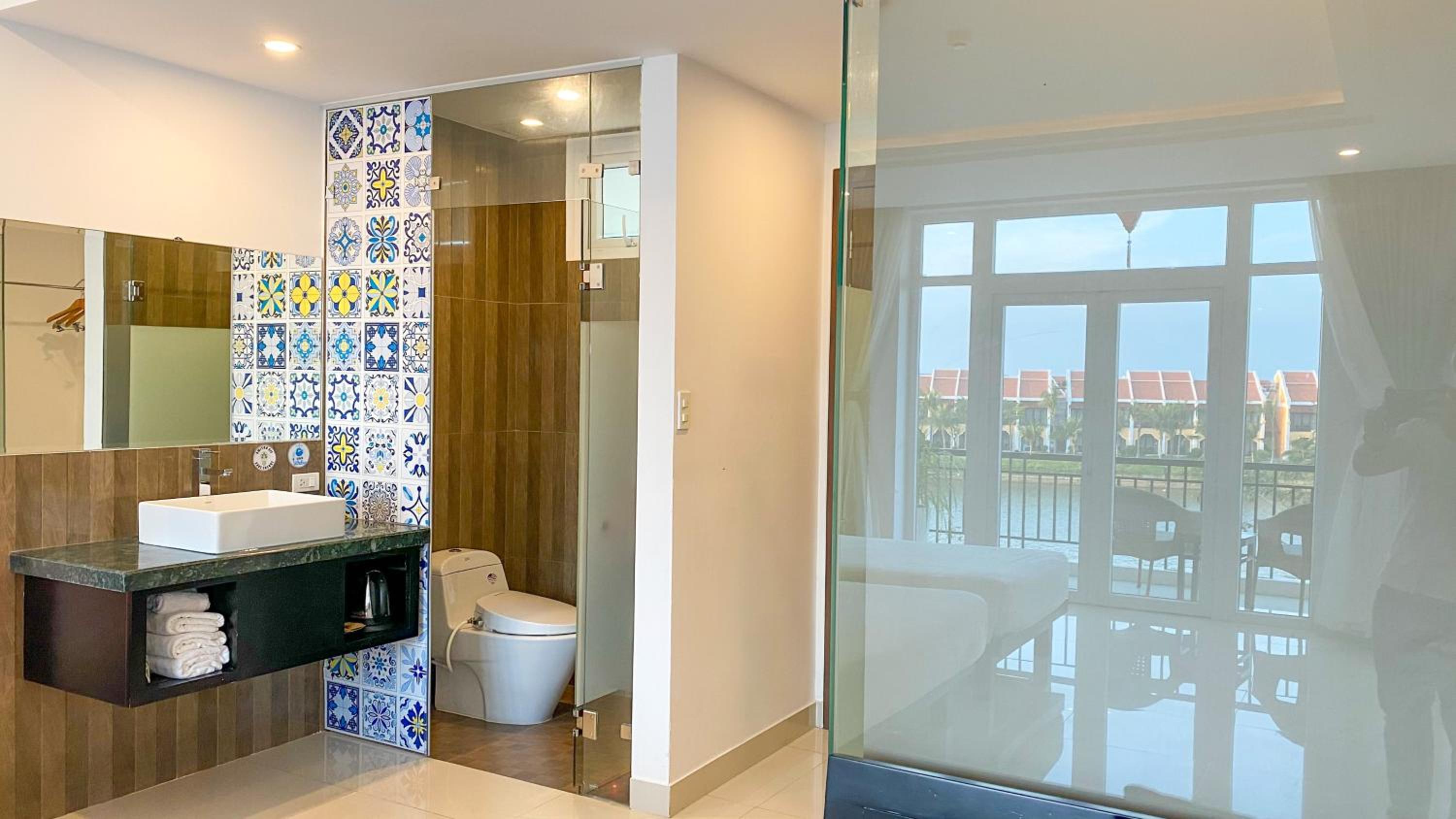 Triple Suite with Balcony and River View photo 2