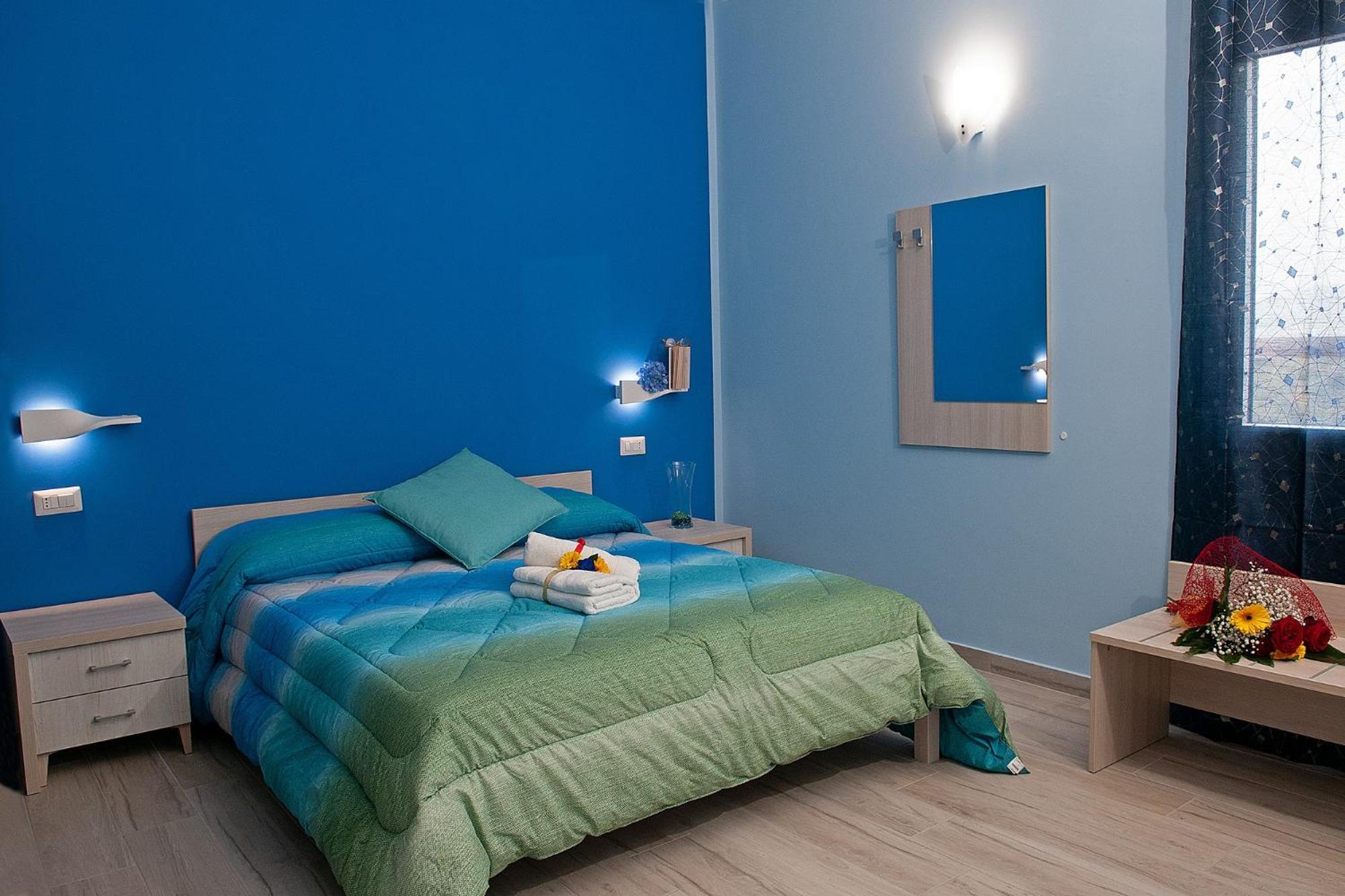 Quadruple Room with Private Bathroom - Photo 1
