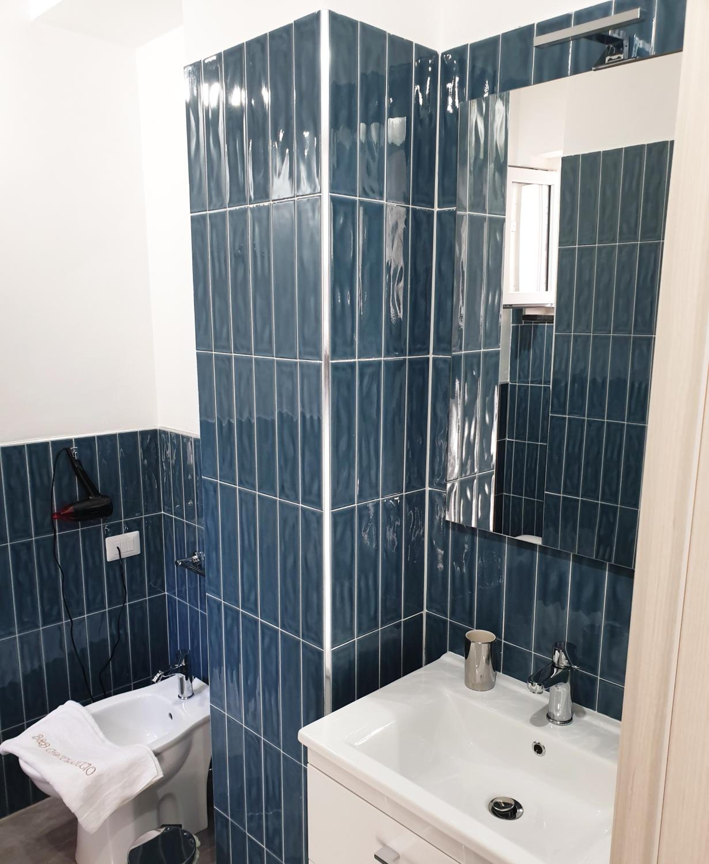 Deluxe Triple Room - Photo 11