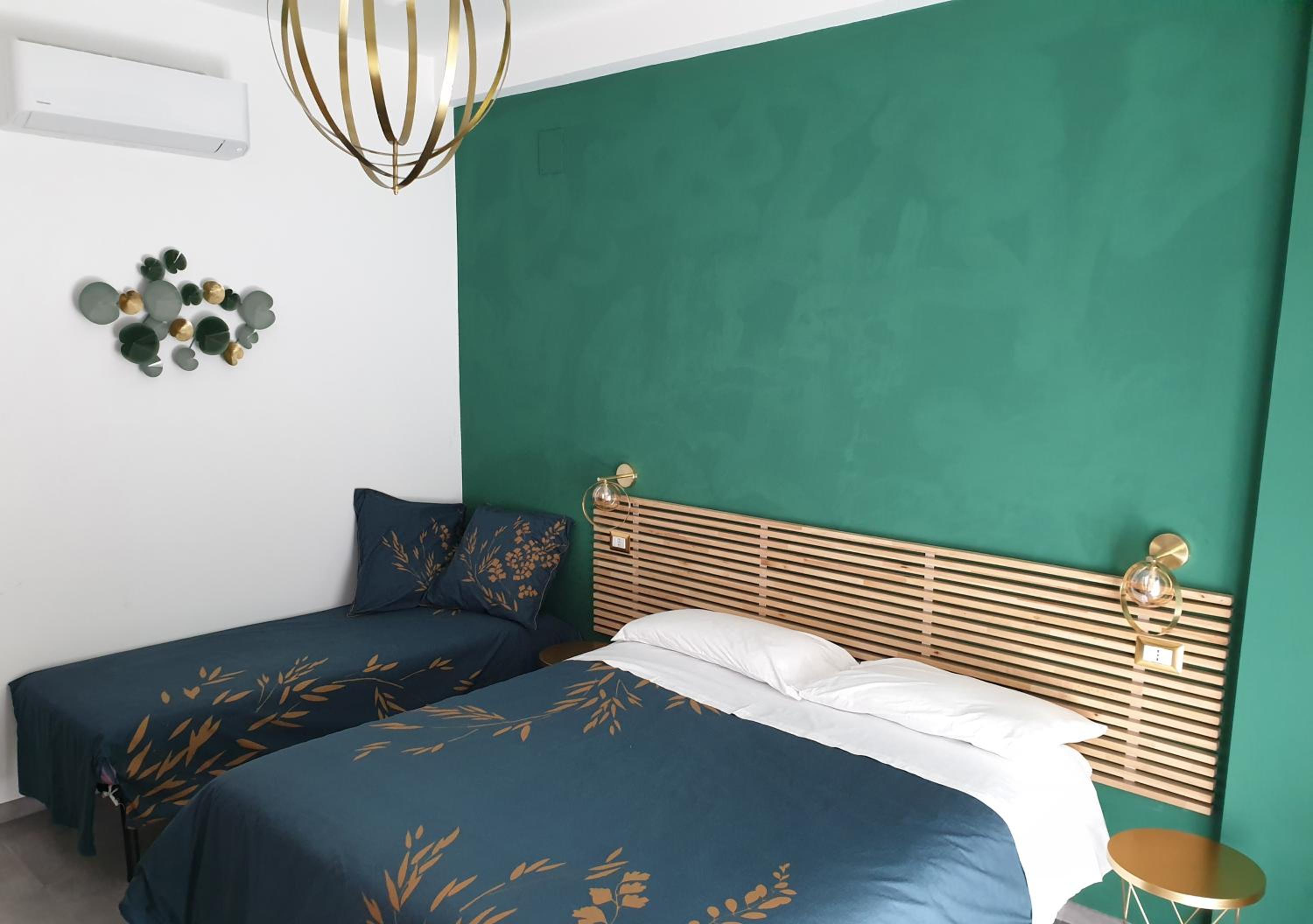 Deluxe Triple Room - Photo 15
