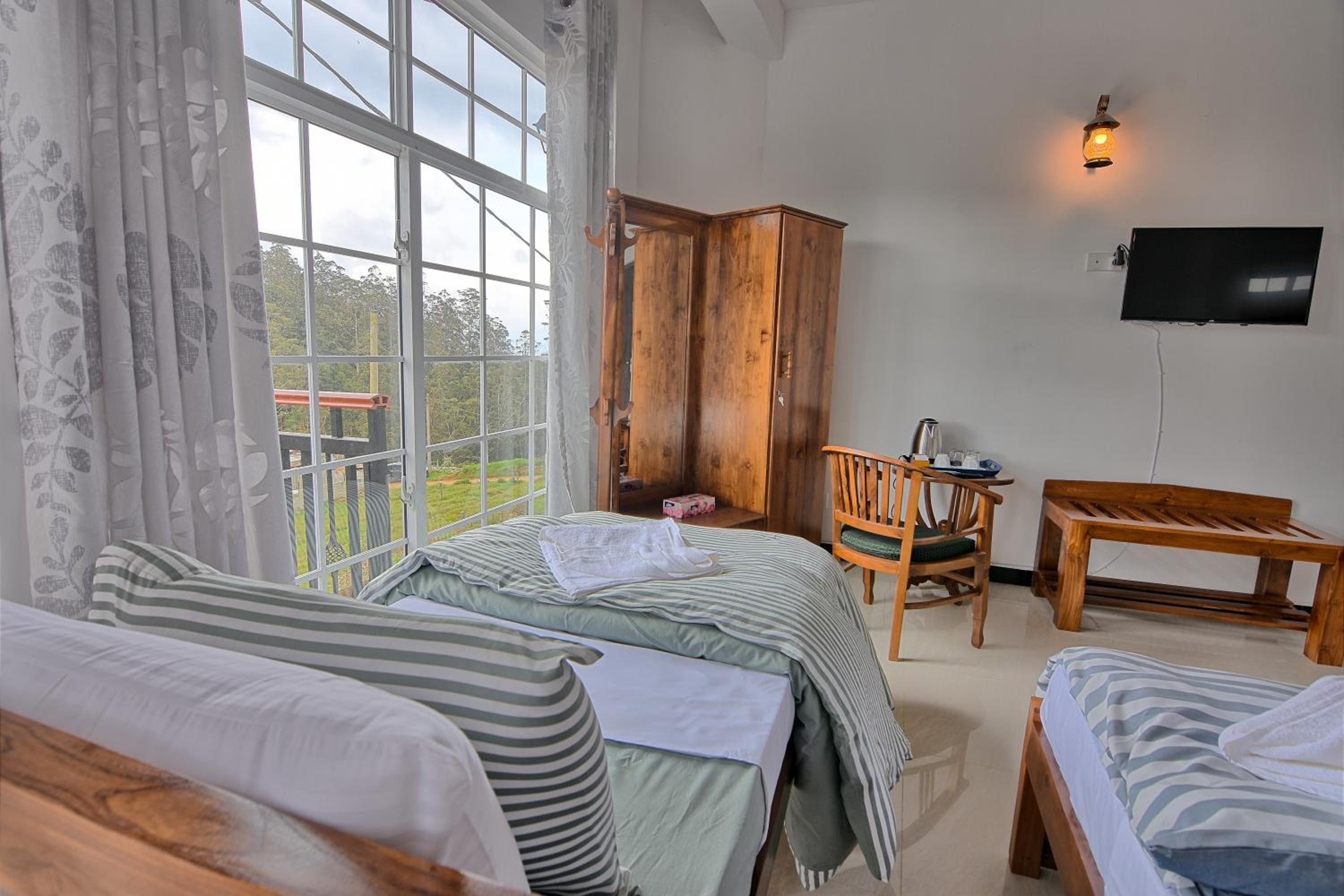 Deluxe Triple Room With Mountain View and Private Balcony photo 2