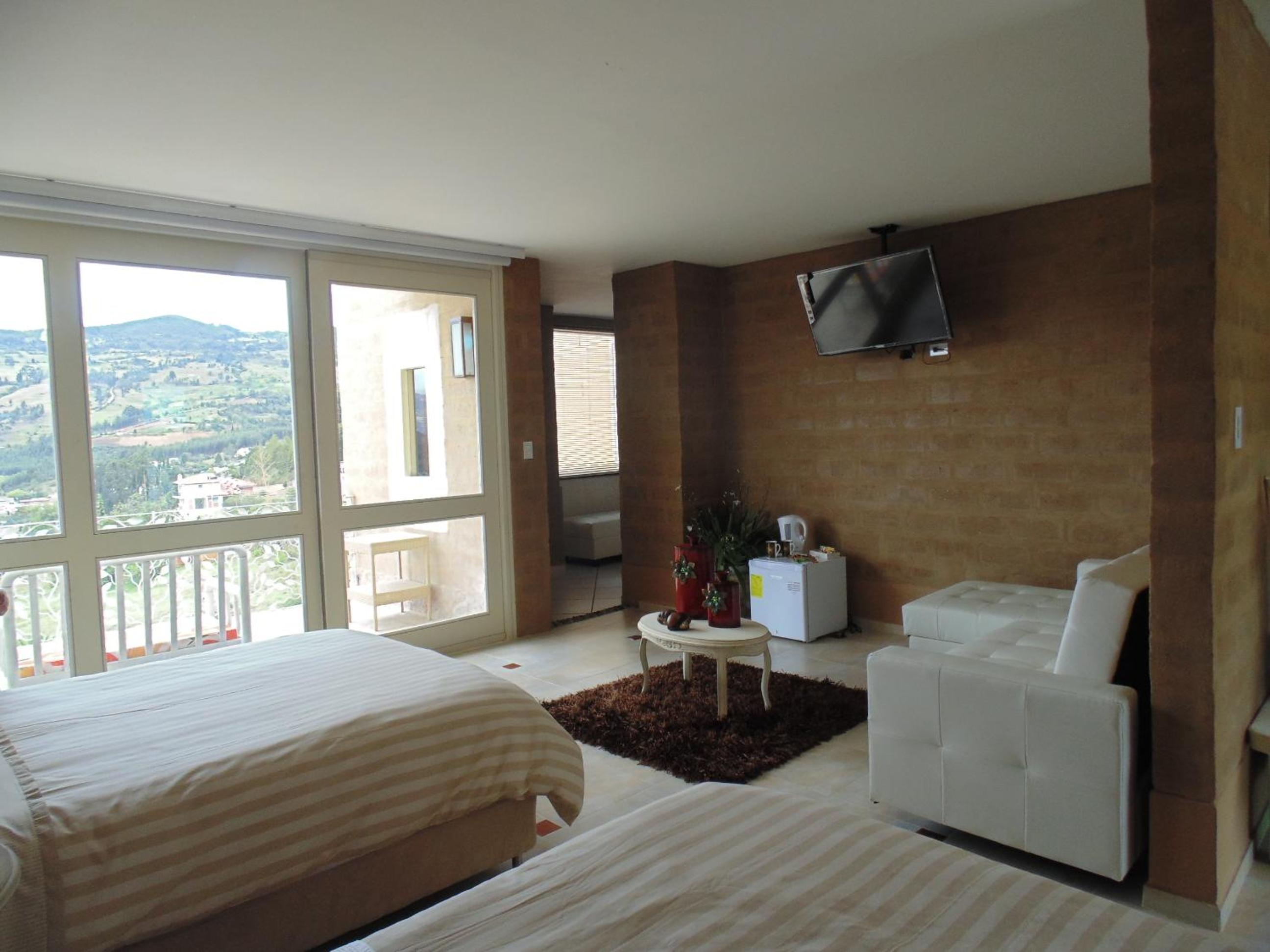 Quadruple Room with Balcony photo 3