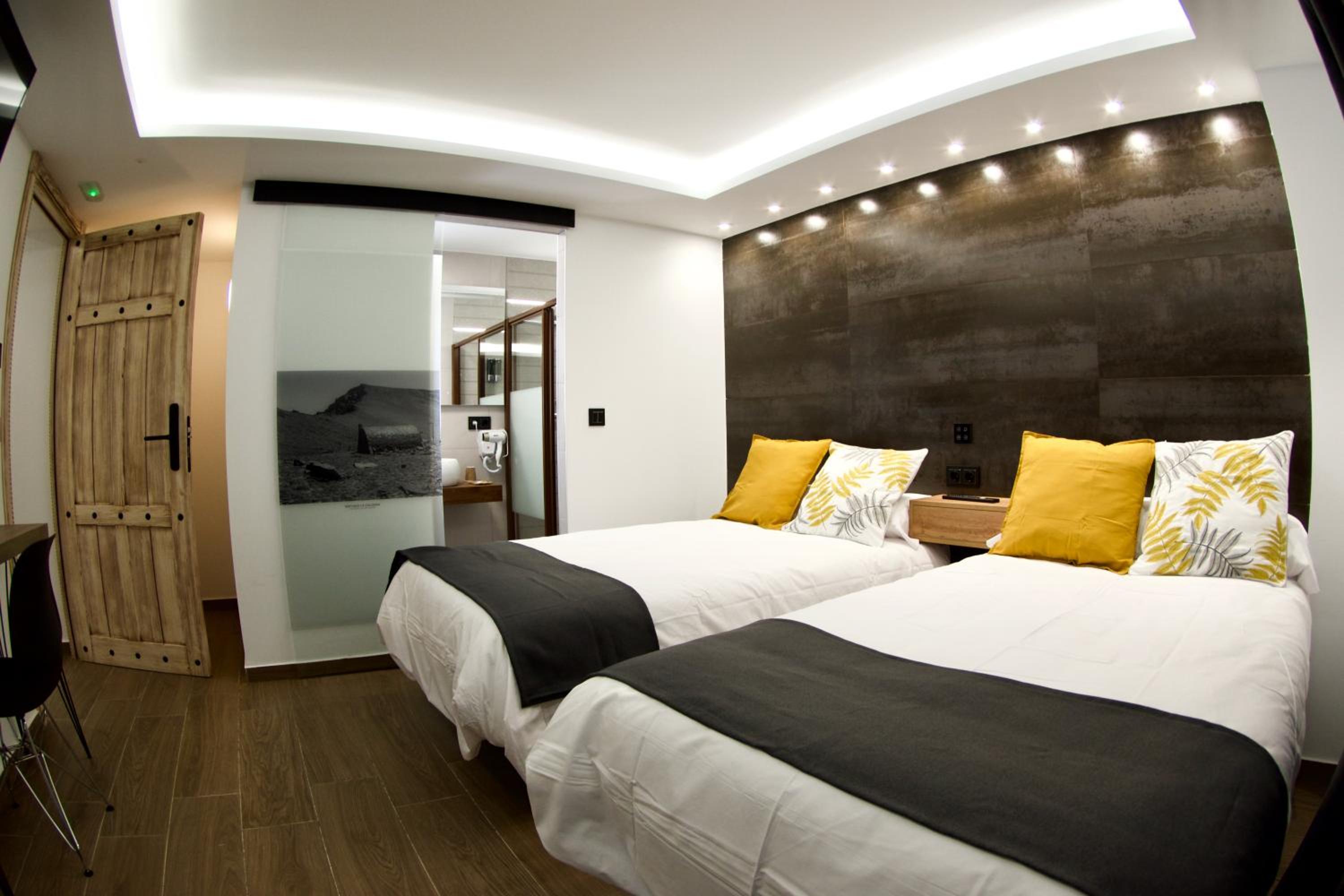 Habitación Doble con Dos Camas Dobles
