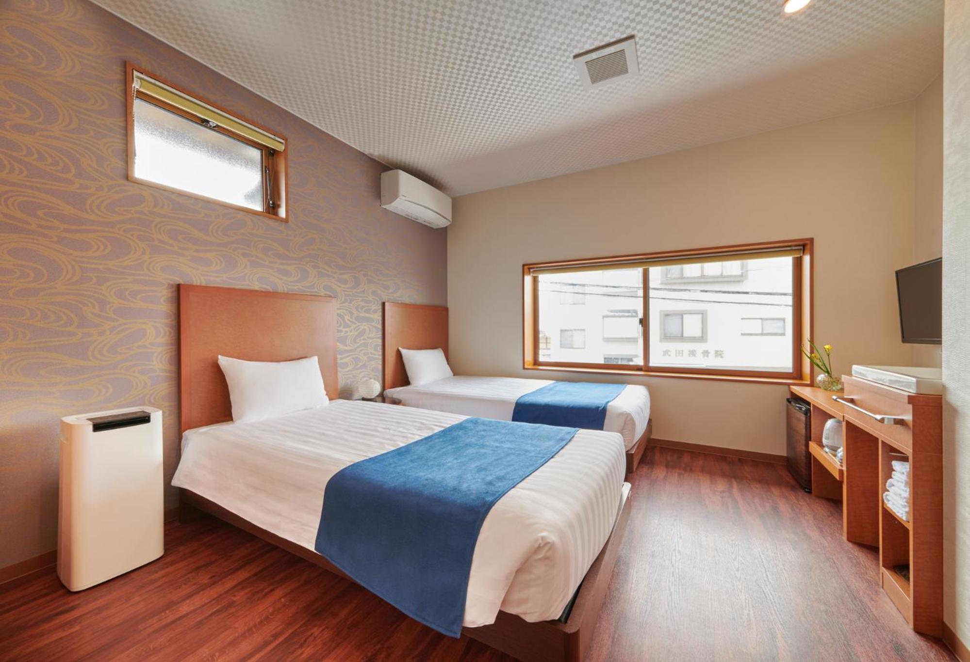 Twin Room - Photo 8