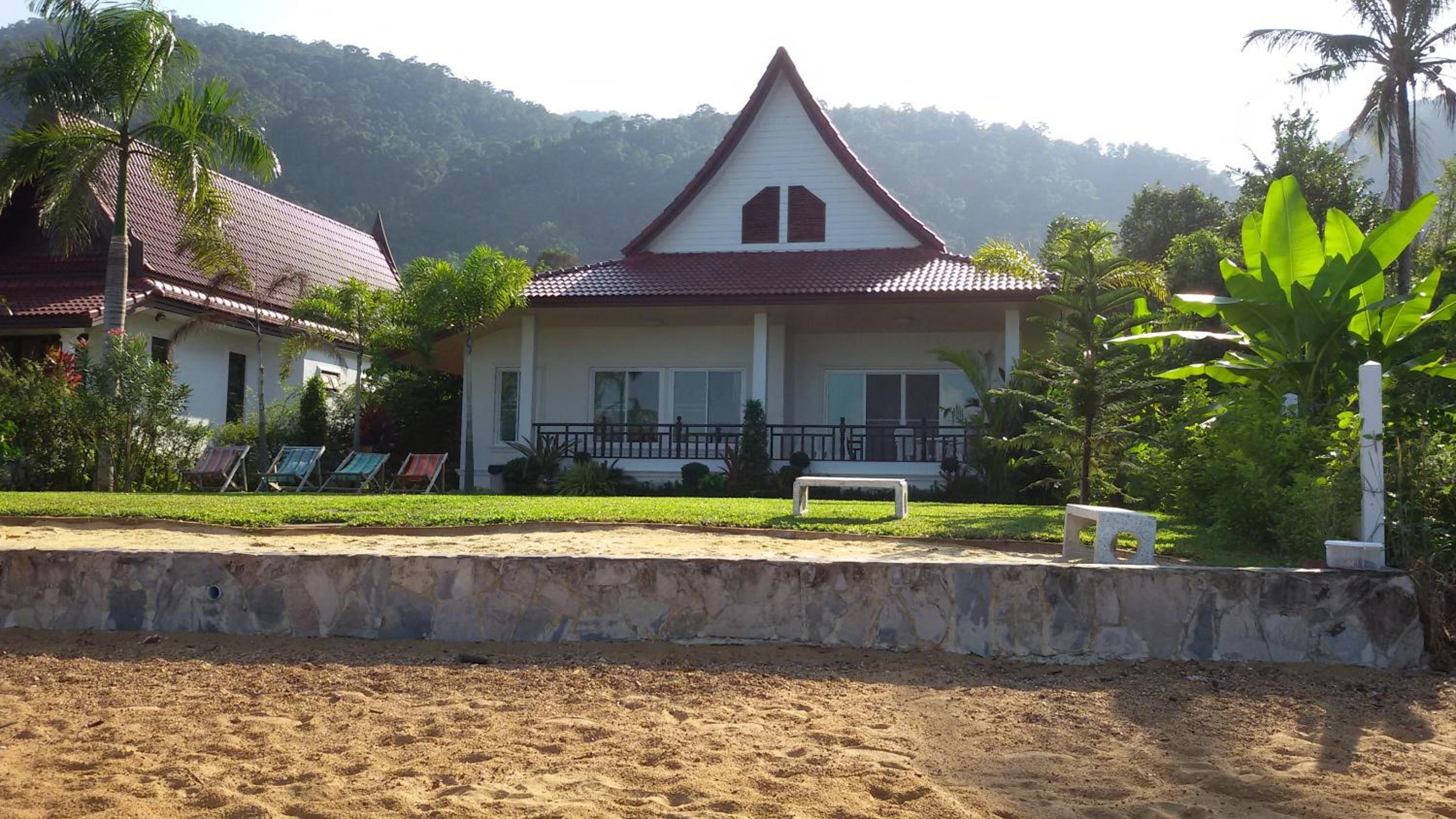 Three-Bedroom House - Photo 32