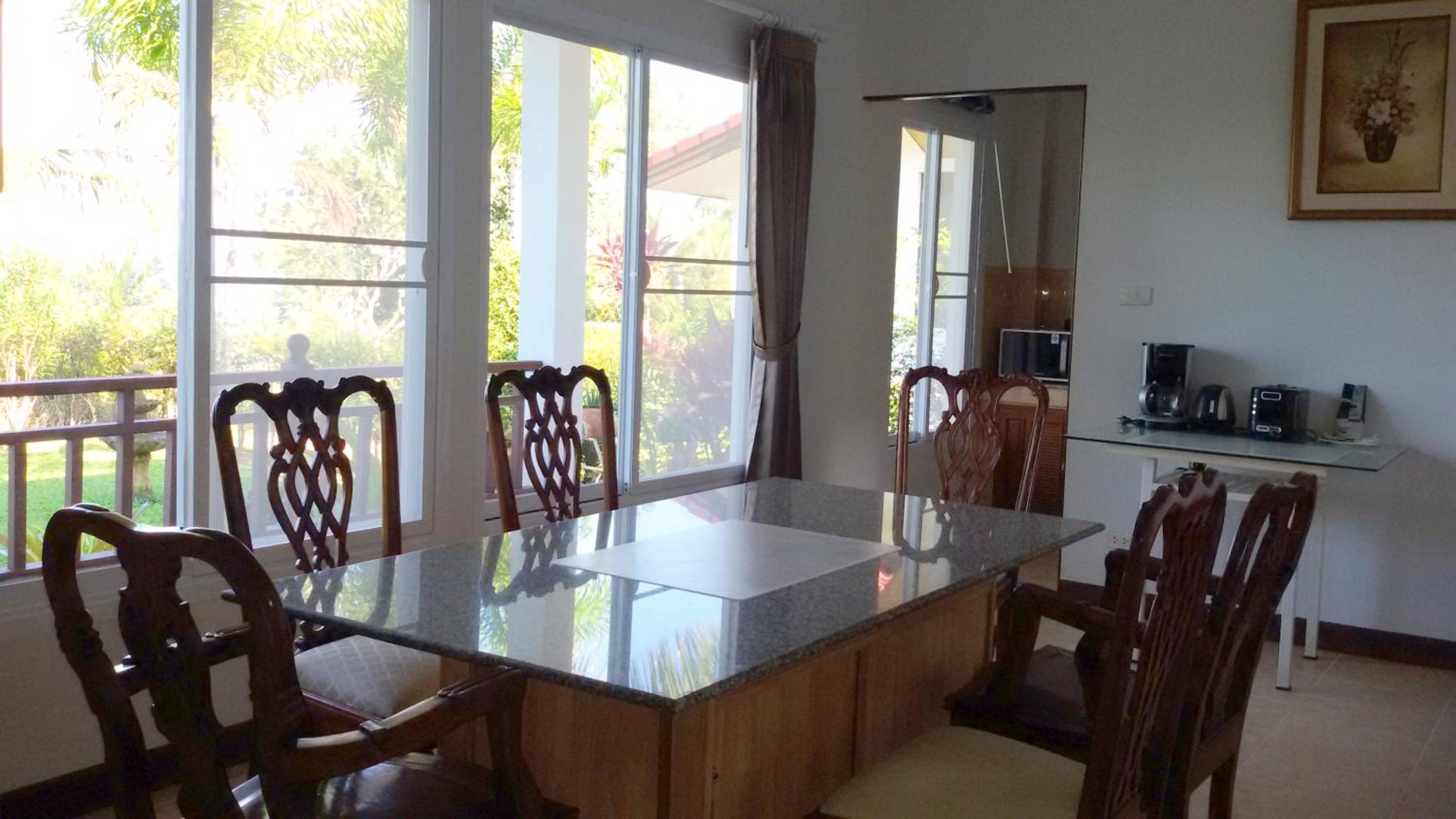 Three-Bedroom House - Photo 30