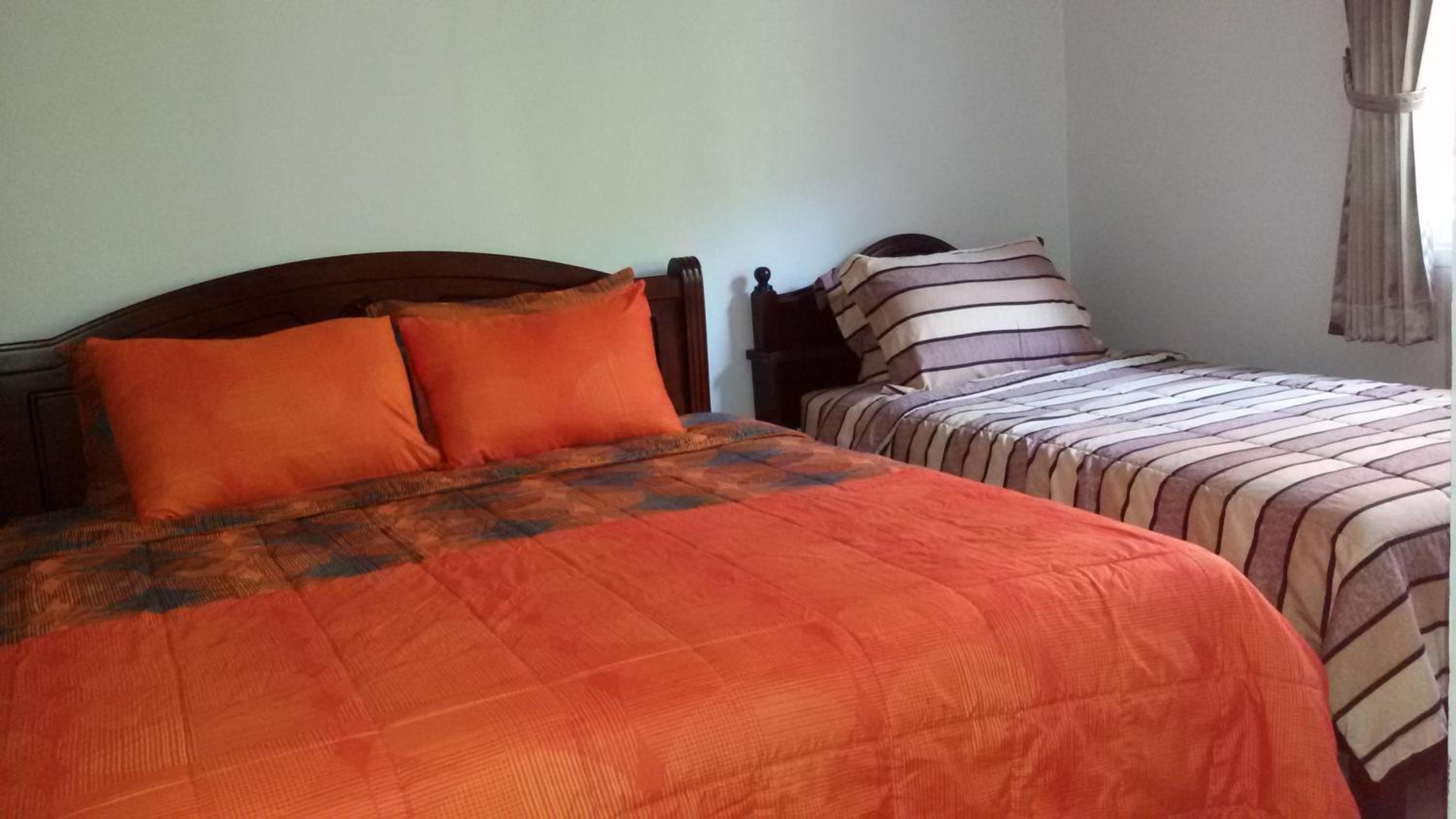 Three-Bedroom House - Photo 29