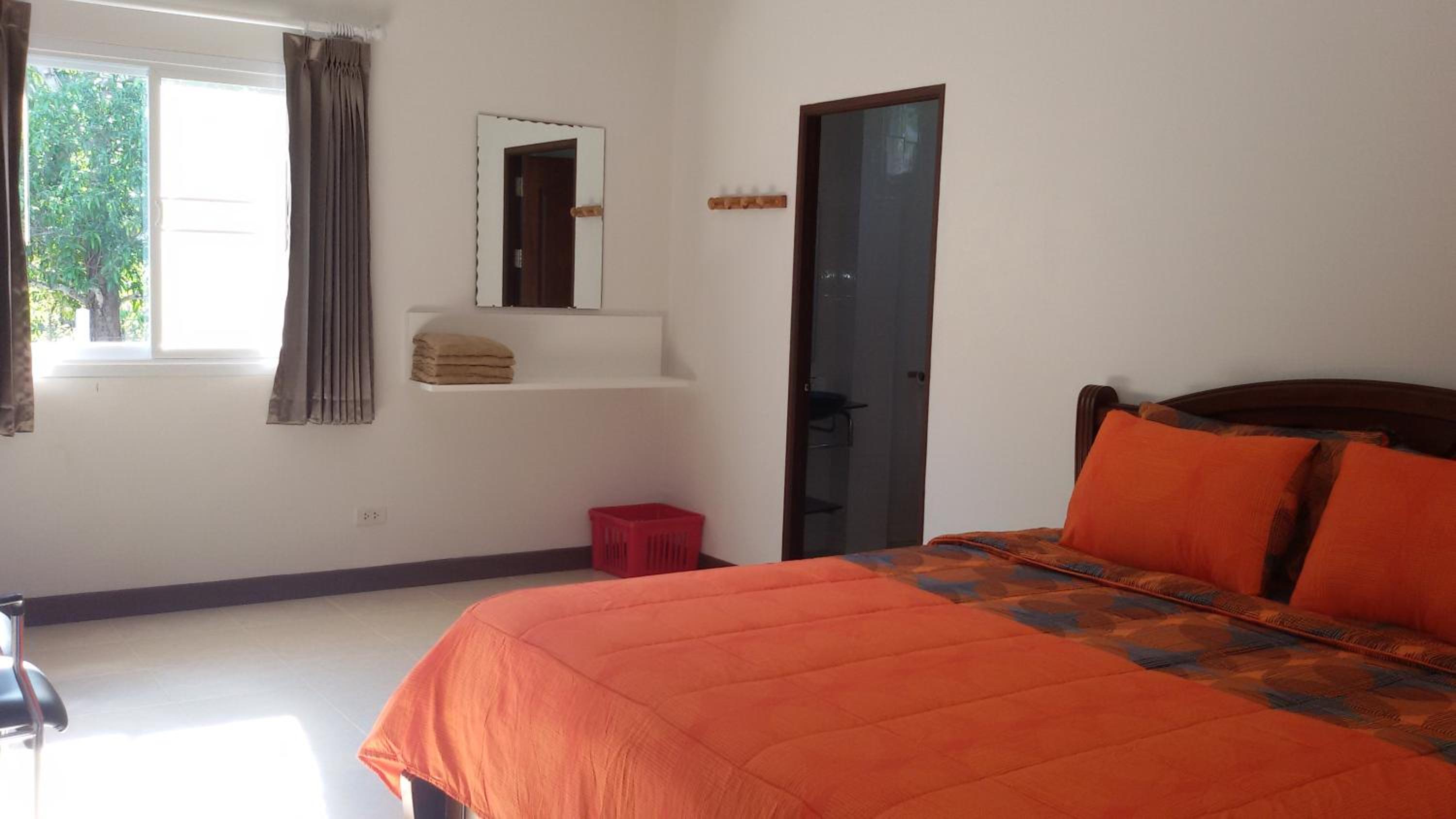Three-Bedroom House - Photo 26