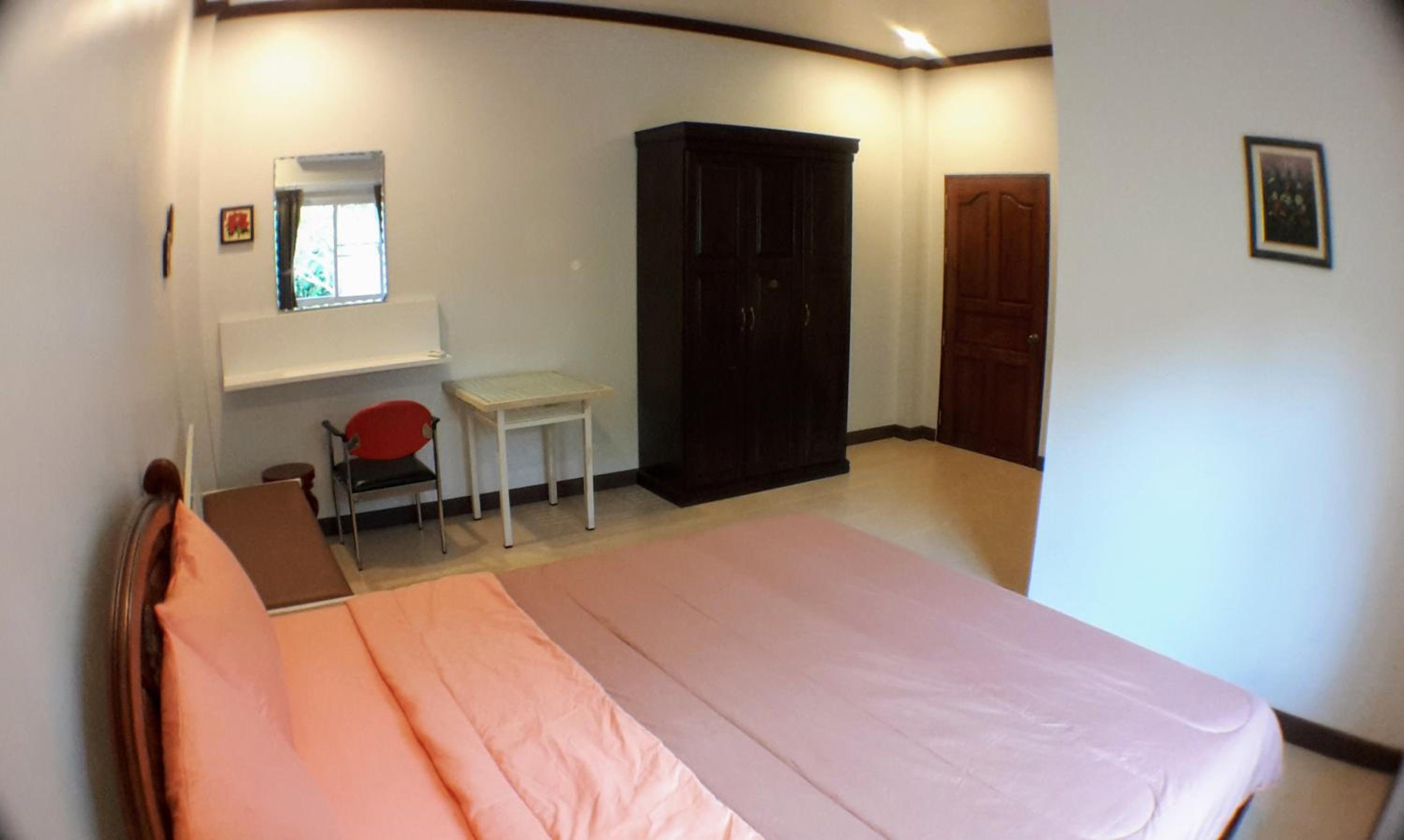 Three-Bedroom House - Photo 24