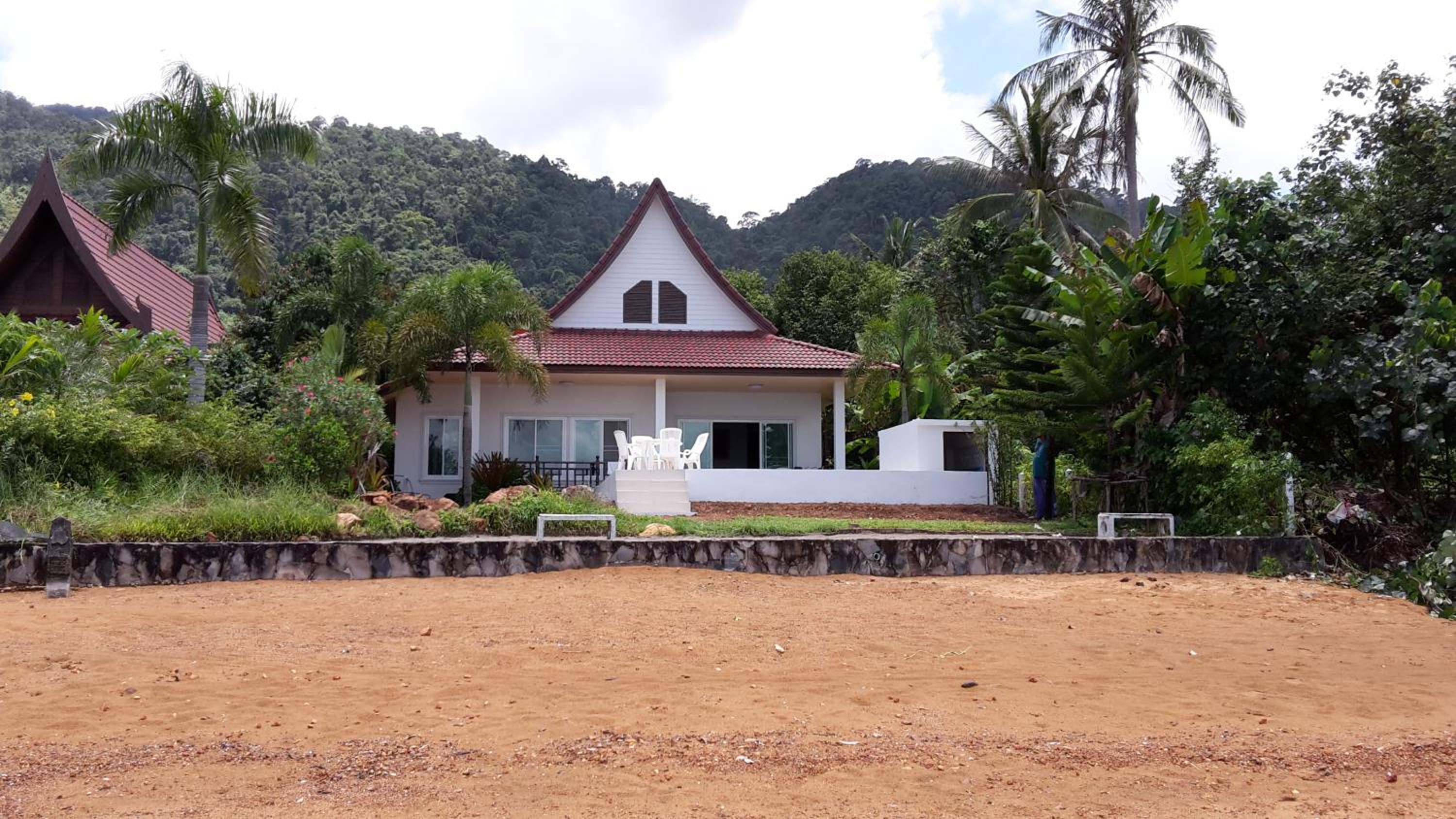 Three-Bedroom House - Photo 33