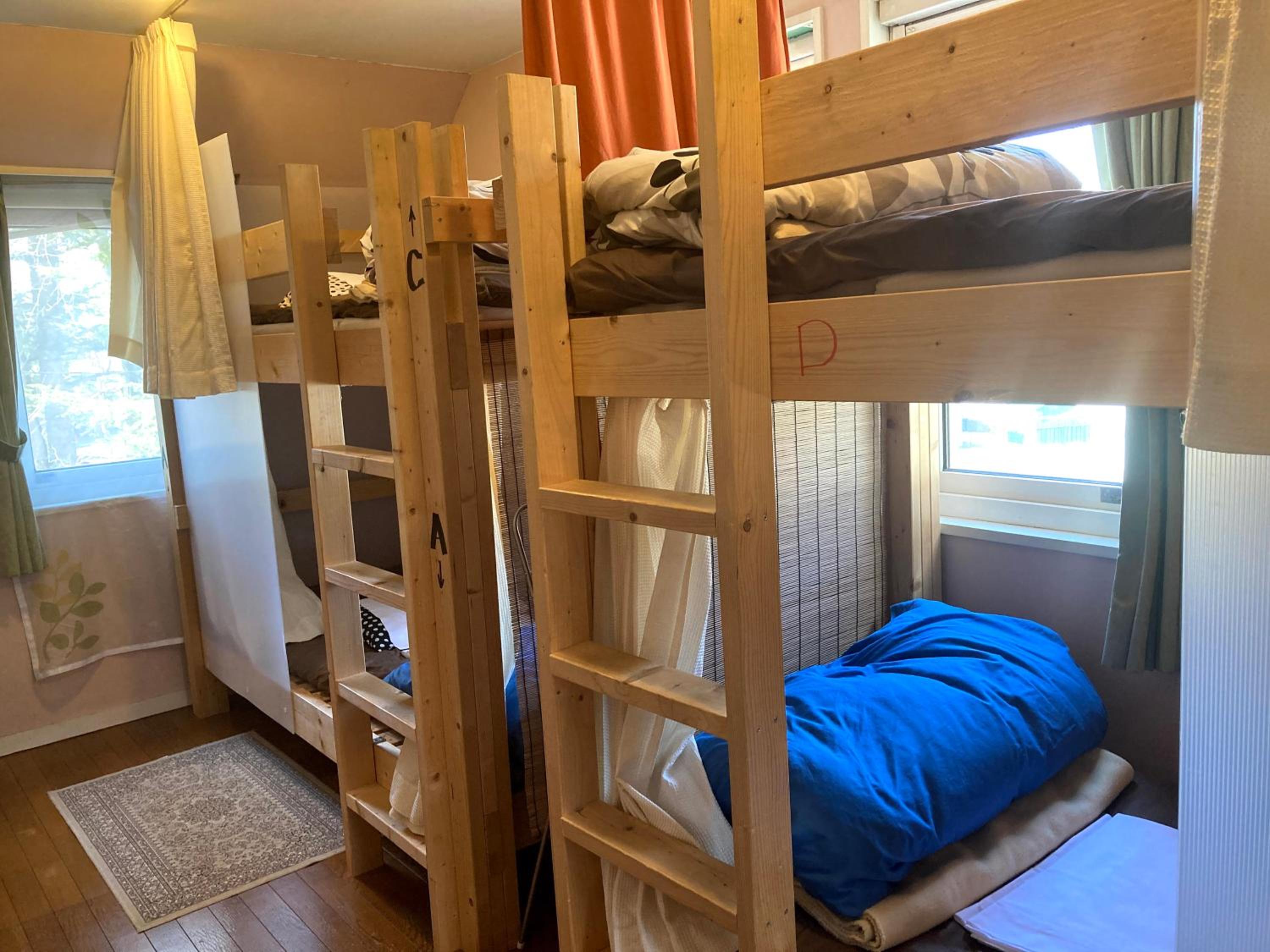 Upper Bunk Bed in Mixed Dormitory Room photo 1