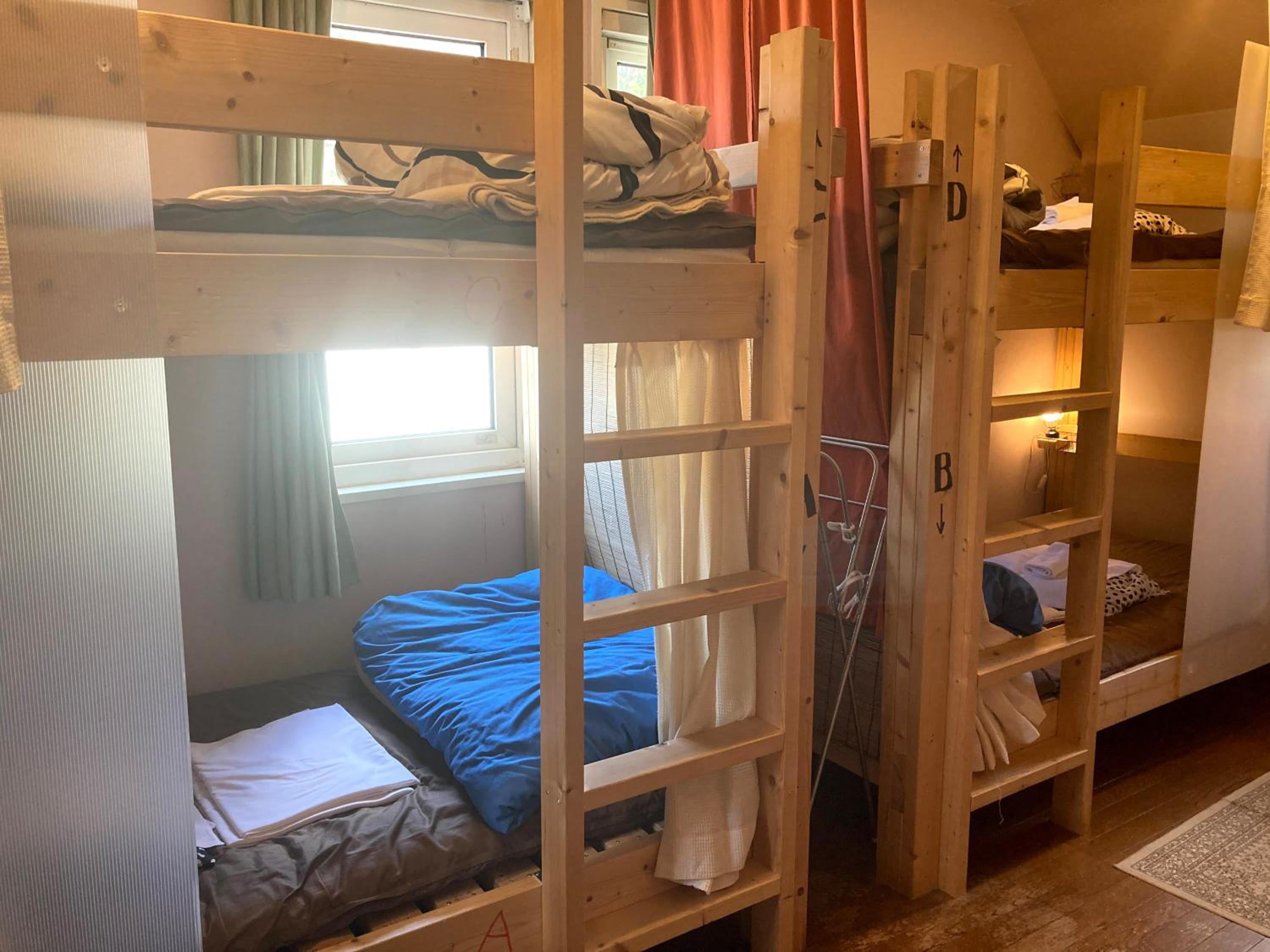 Upper Bunk Bed in Female Dormitory Room photo 2