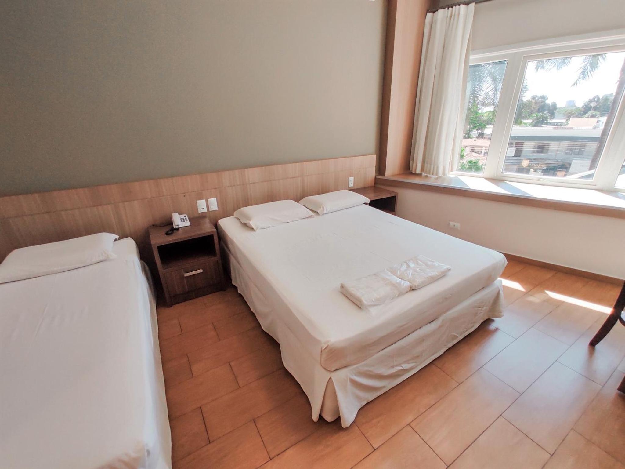 Triple Room with 1 Double and 1 Single Bed - Photo 1