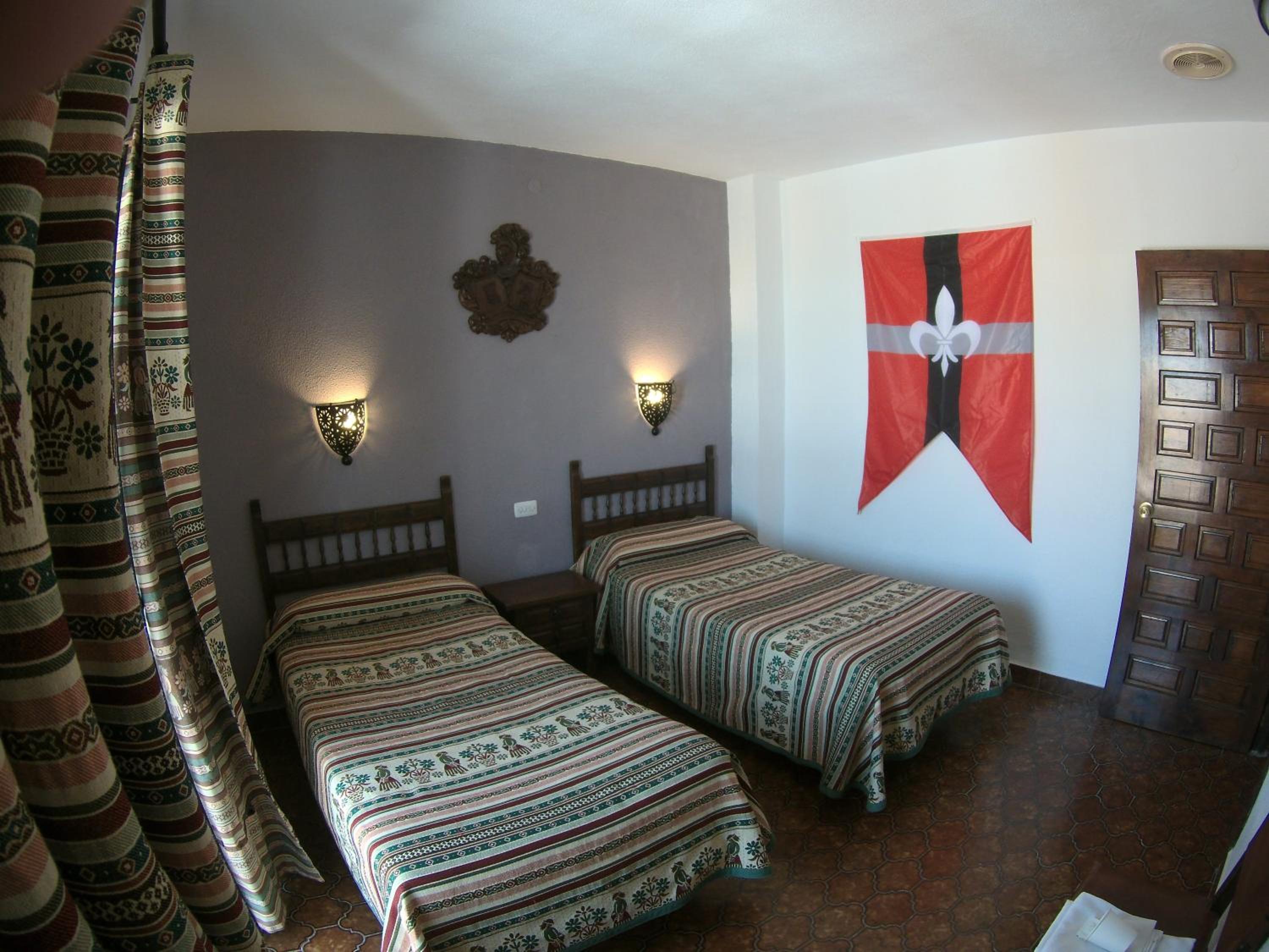 Habitación Familiar con Balcón (2 Adultos + 2 Niños)