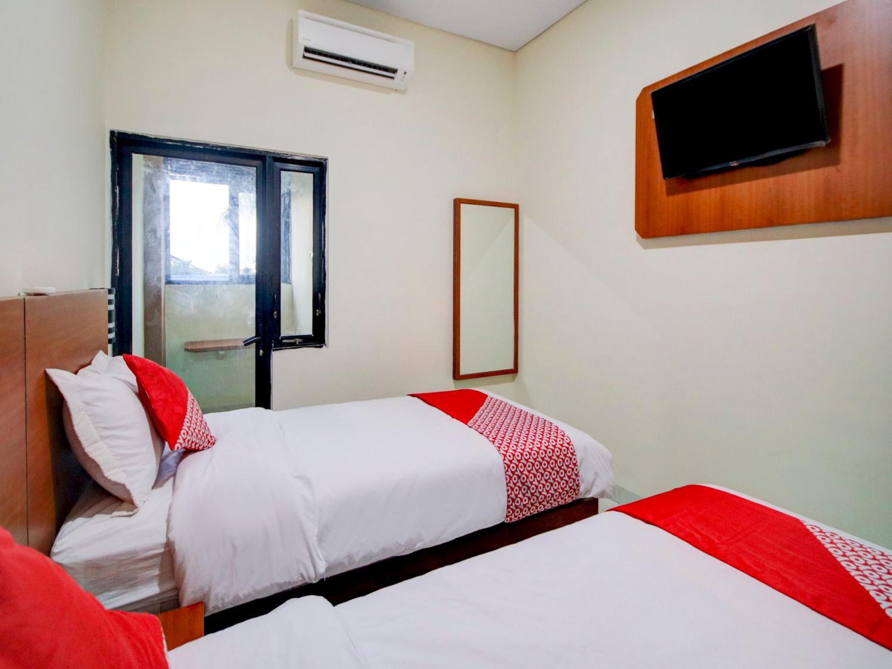 Delxue Twin Room - Photo 8