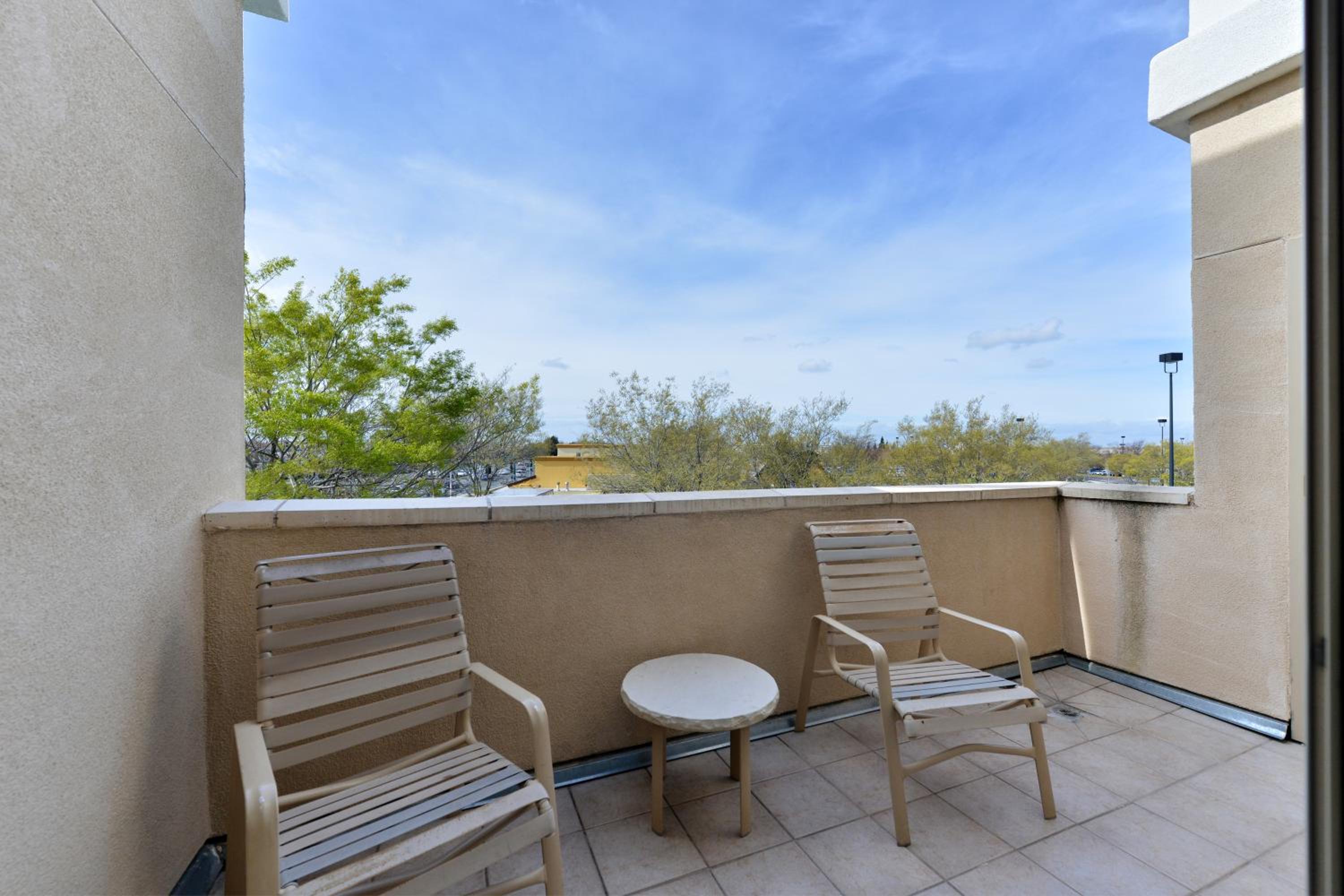 Standard Queen Room with Two Queen Beds and Balcony - Photo 1