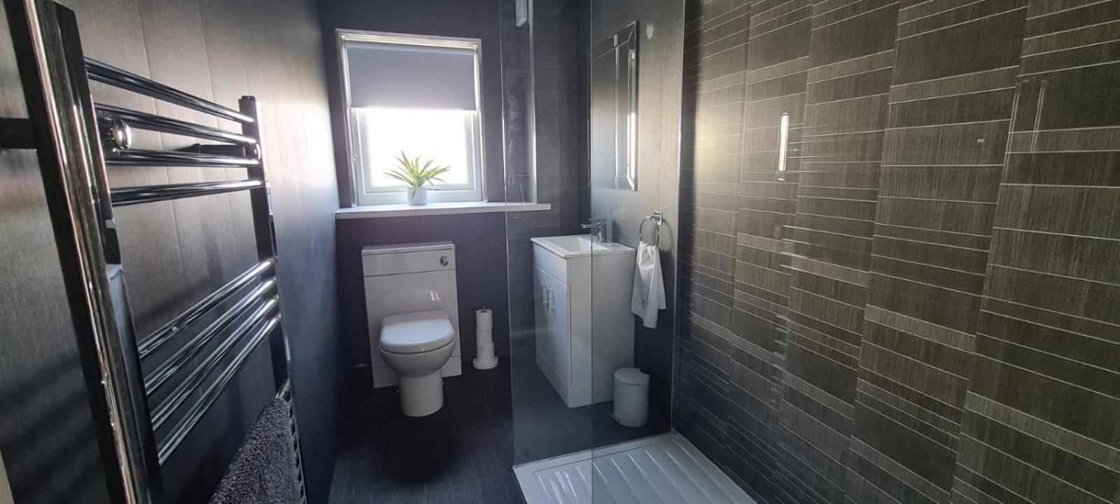 Two-Bedroom Apartment - Photo 40