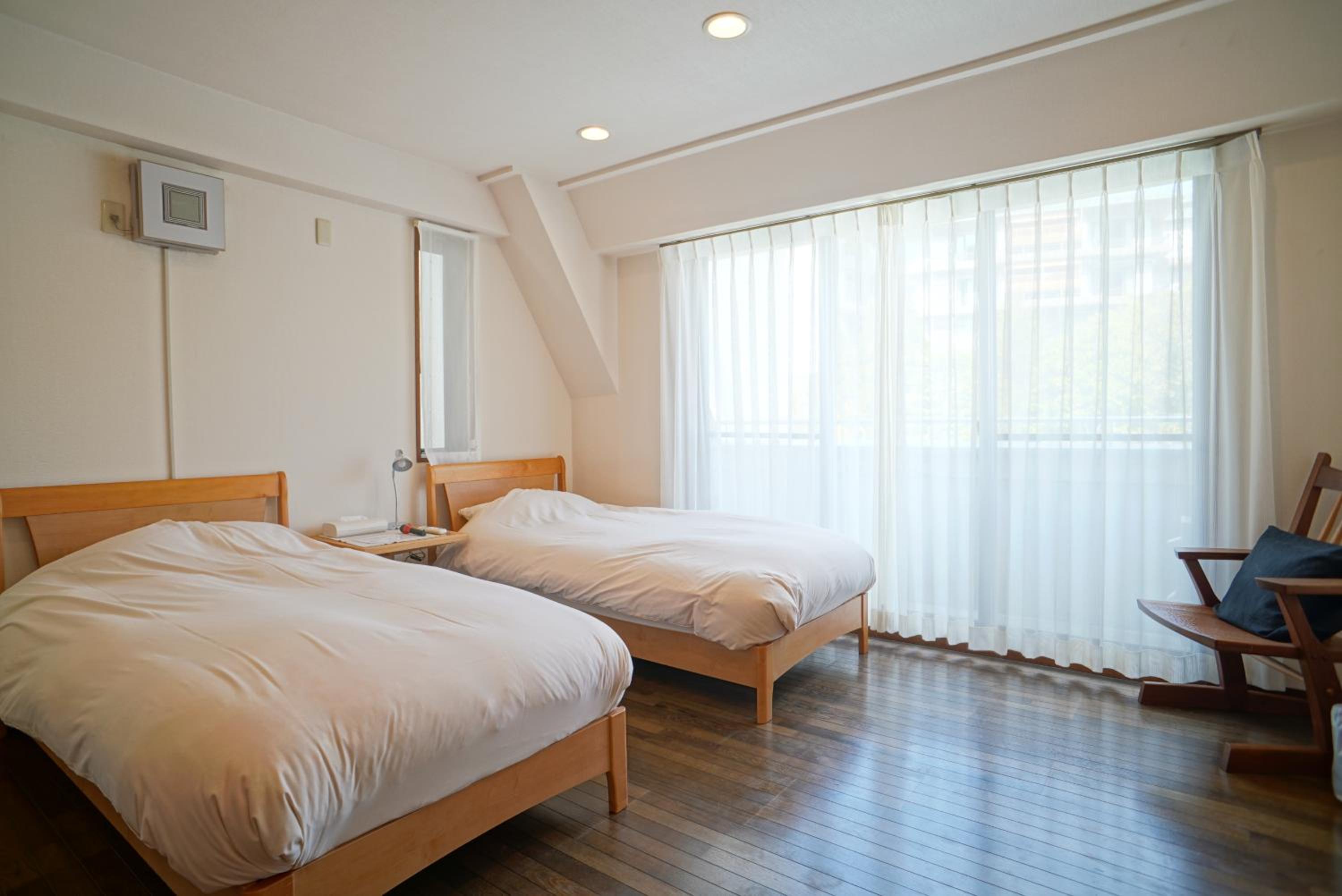 Three-Bedroom Apartment - Photo 12