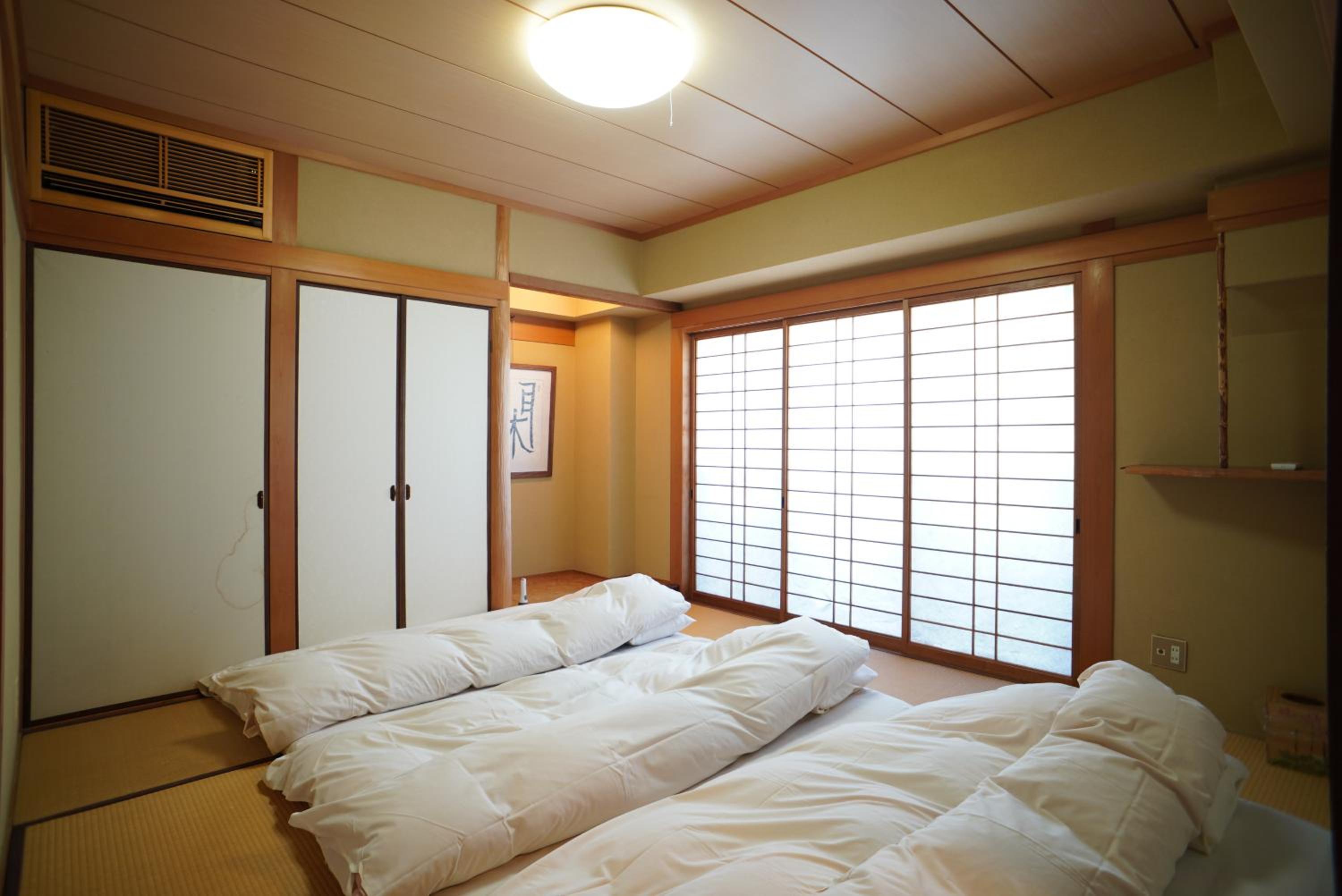 Three-Bedroom Apartment - Photo 9