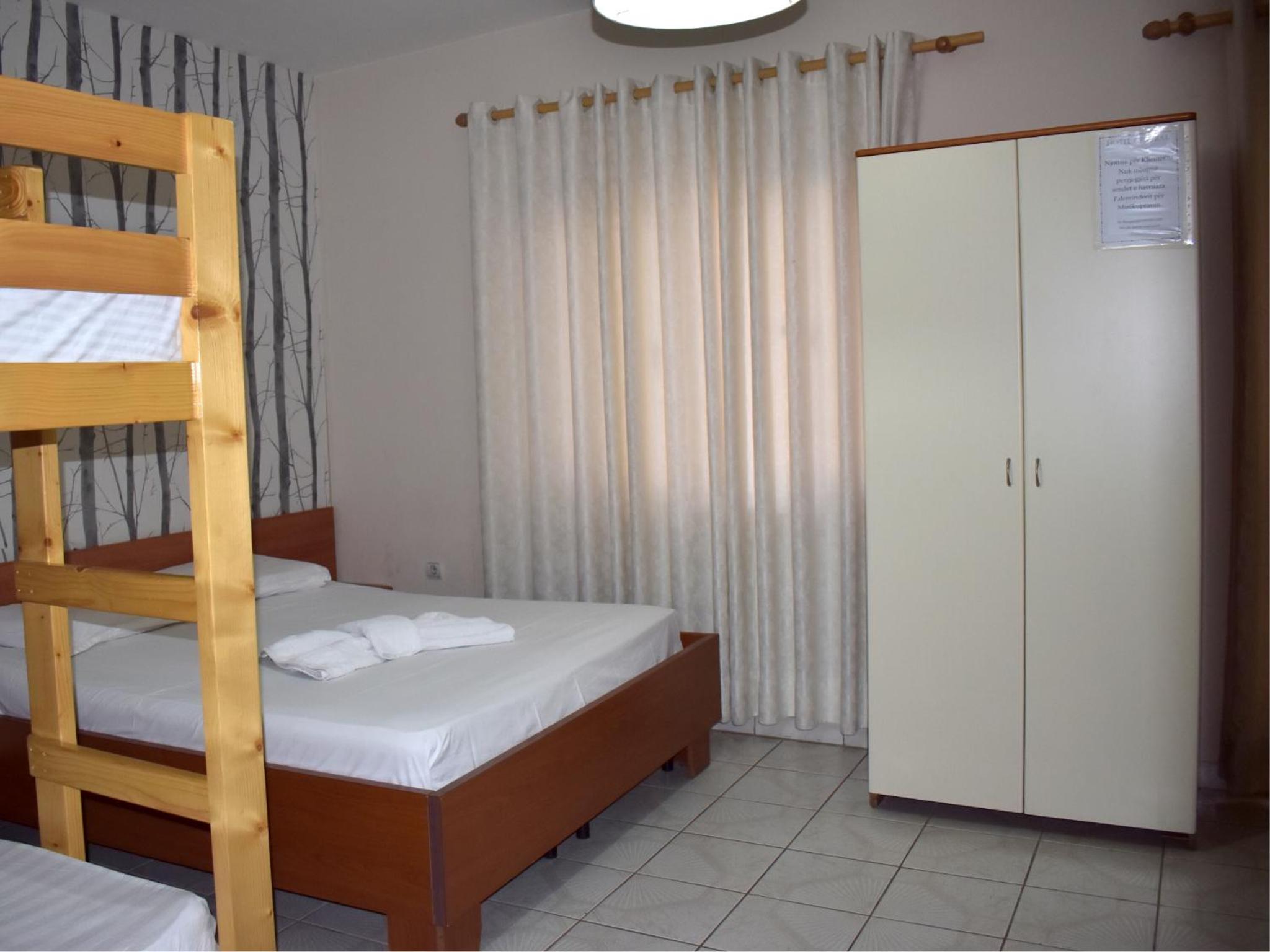Economy Quadruple Room with Shared Bathroom