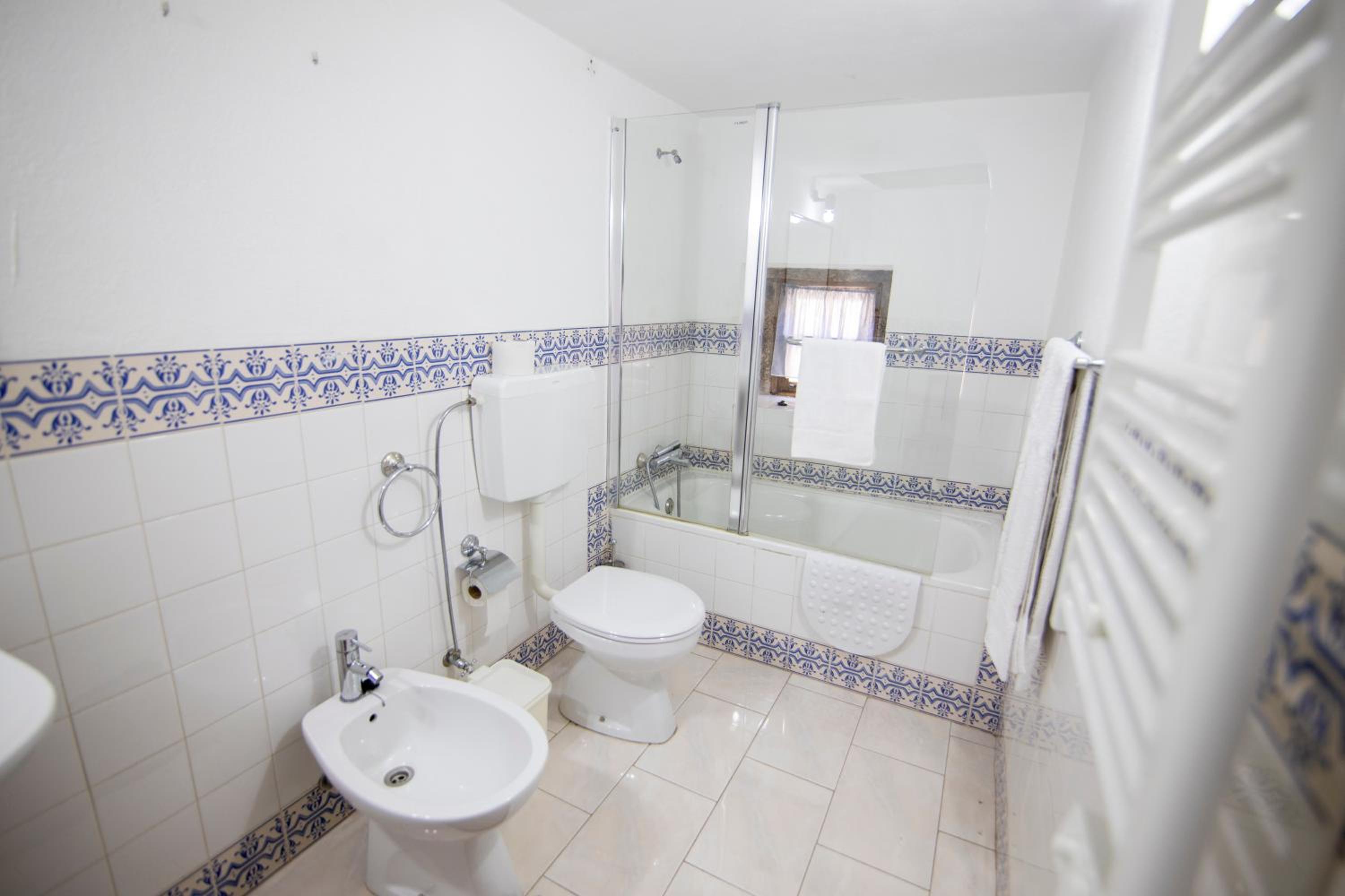 Three-Bedroom House - Photo 13