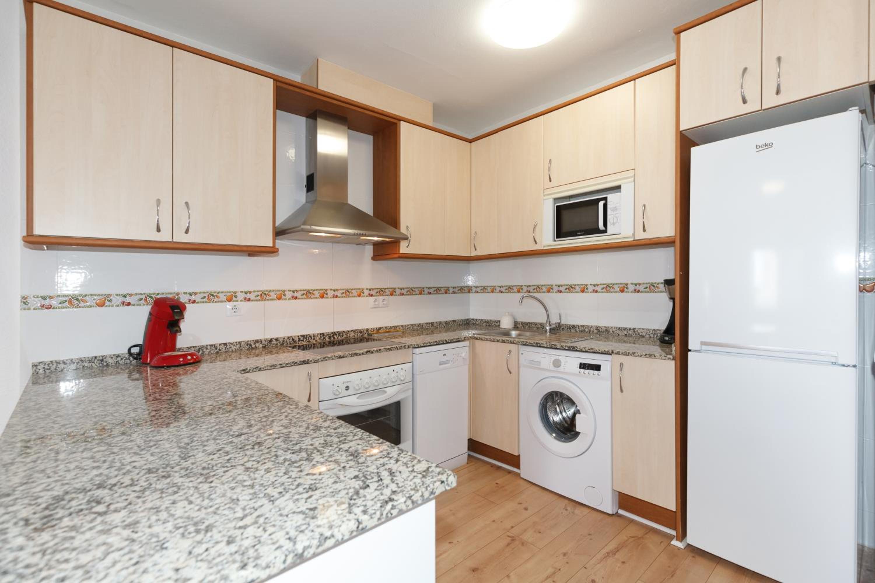 Apartment with Balcony - Photo 16