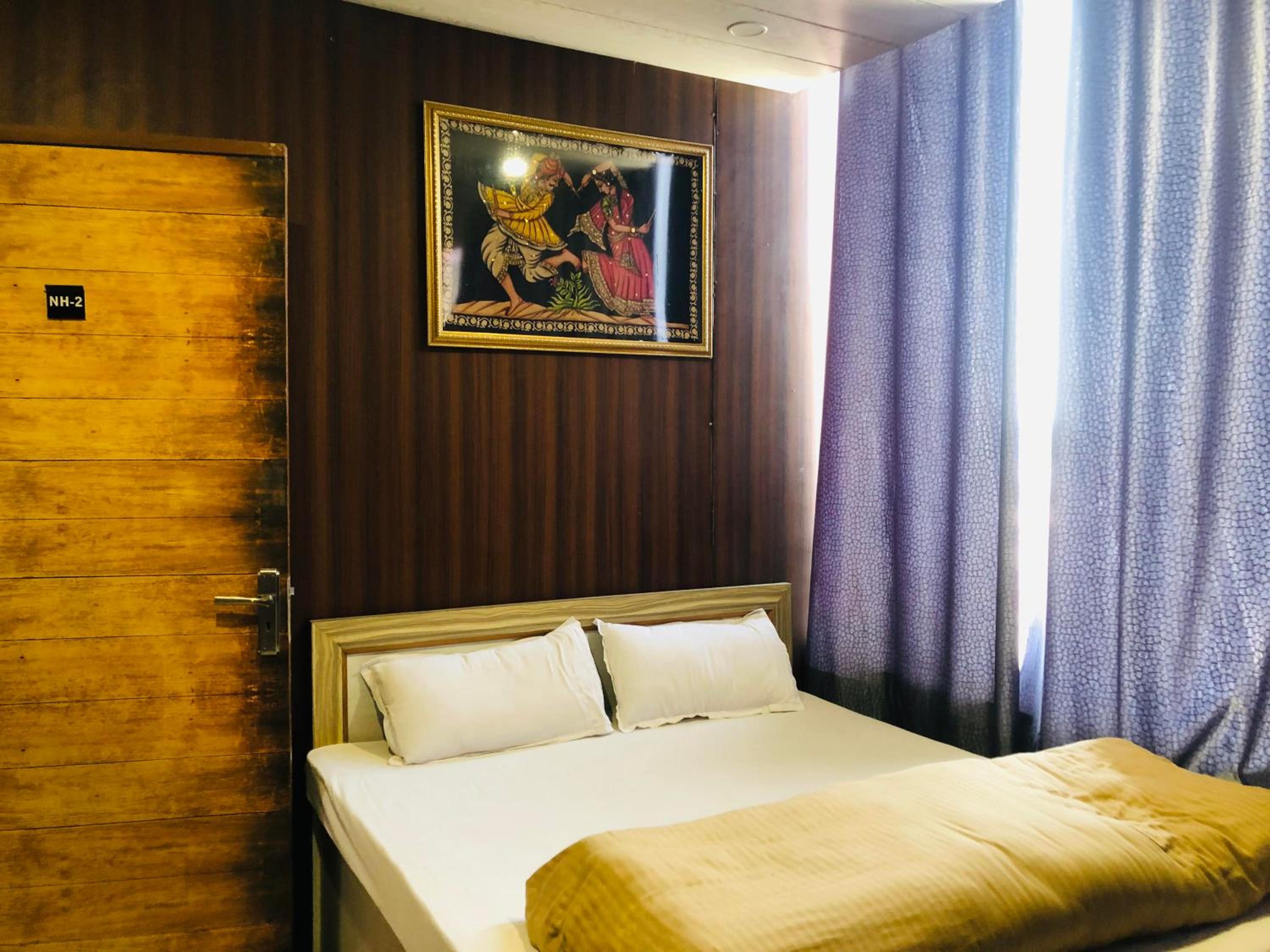 Budget Double Room - Photo 1