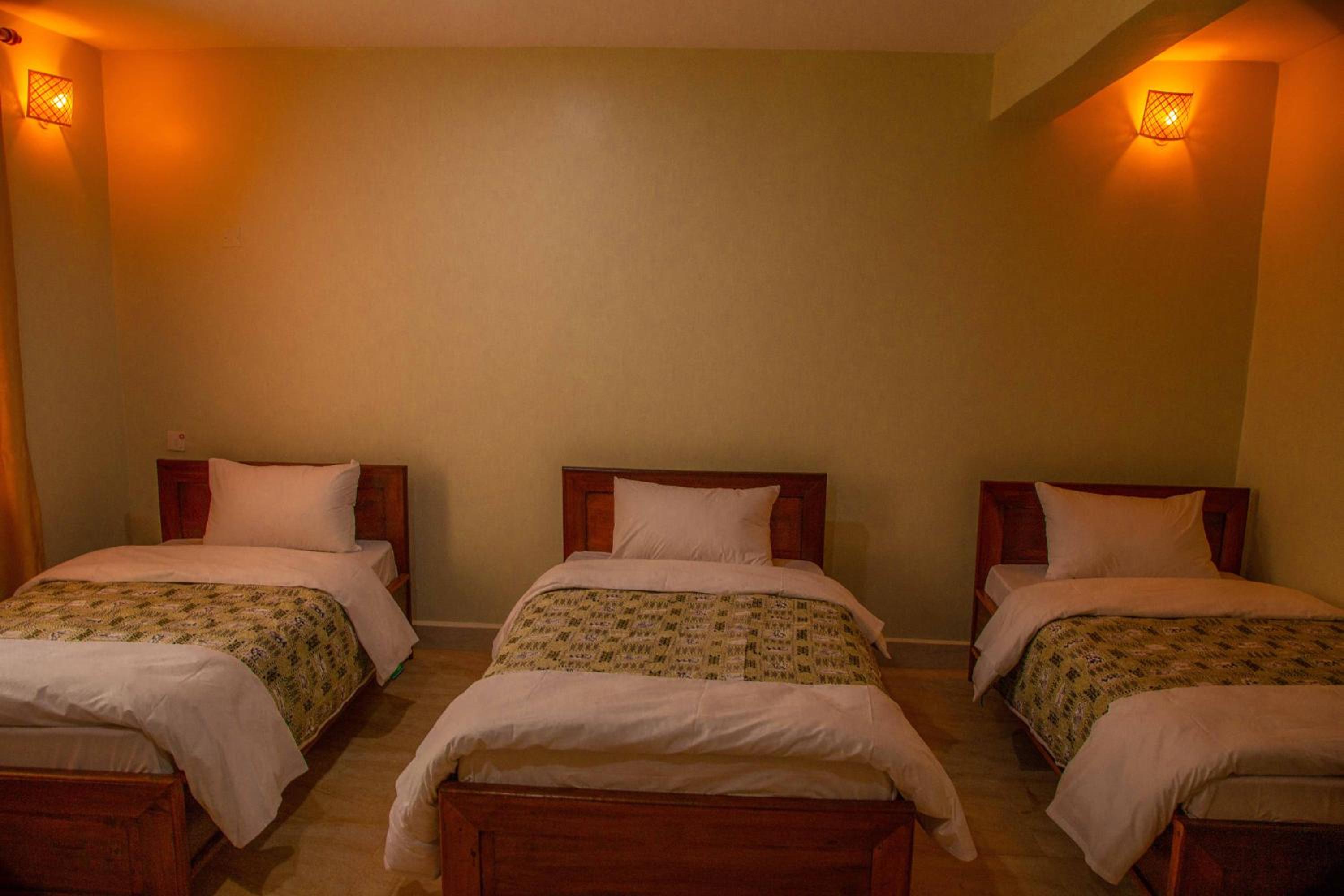 Deluxe Triple Room - Photo 1