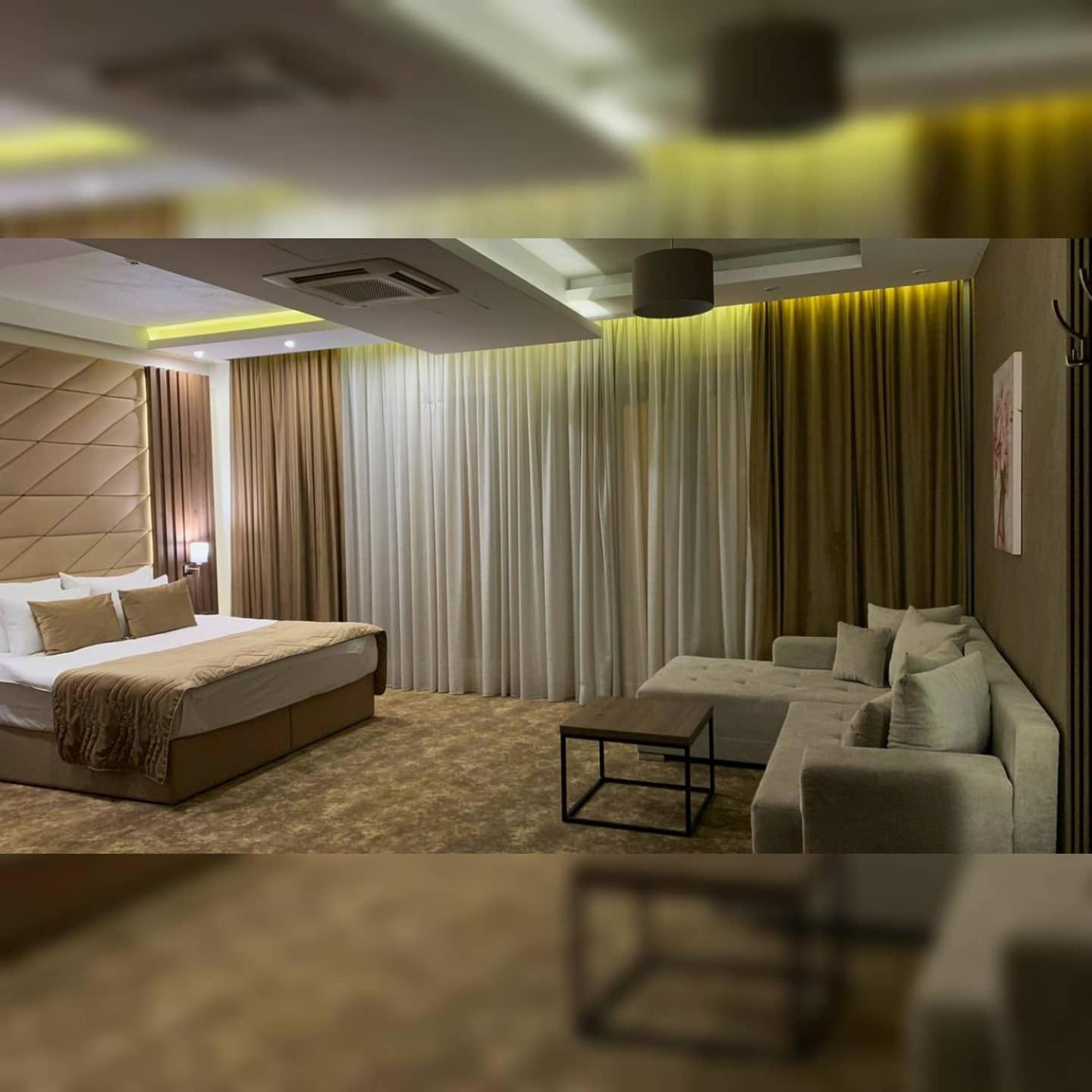Deluxe Double Room with Extra Bed - Photo 1