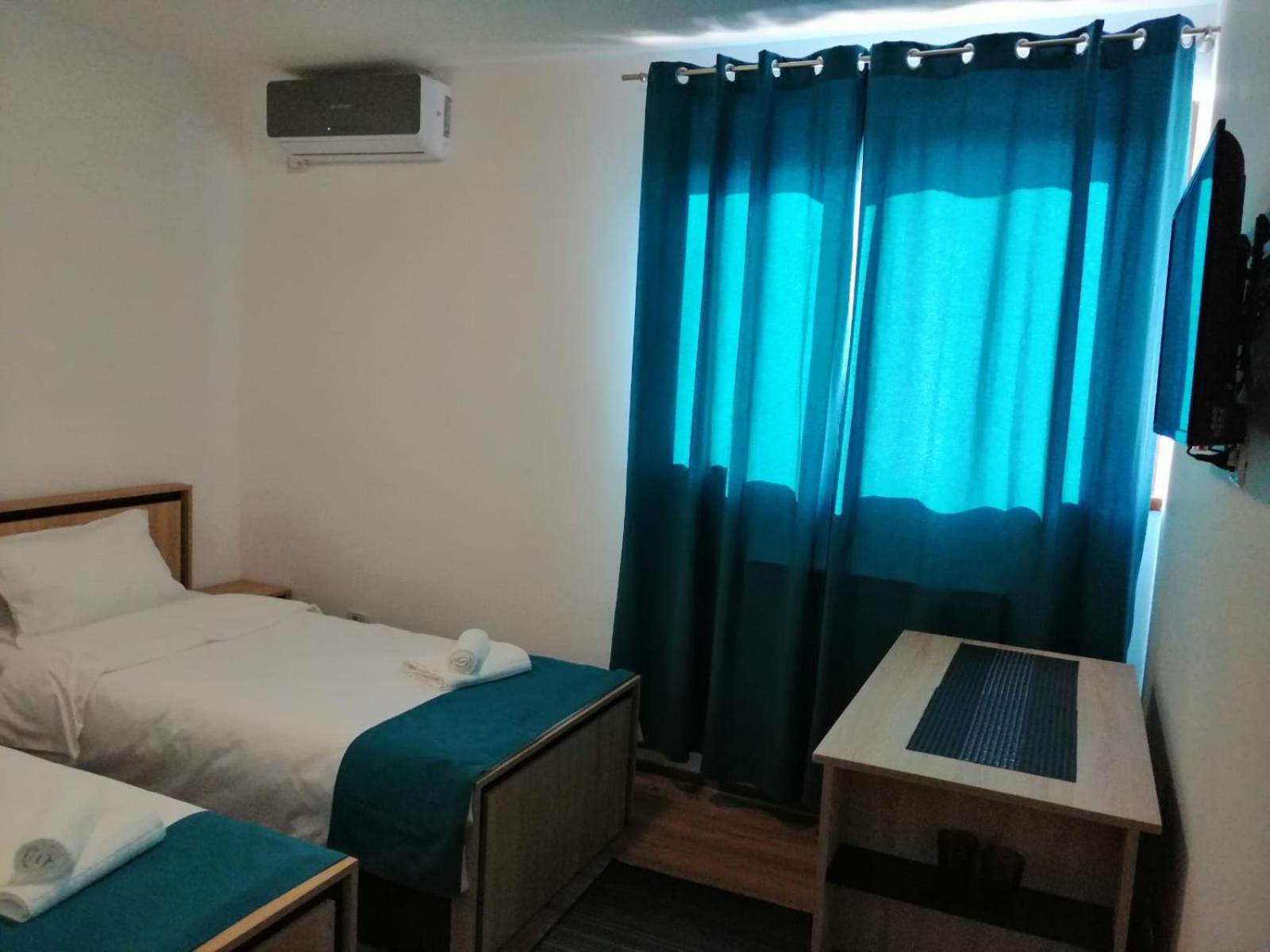 Twin Room - Photo 1