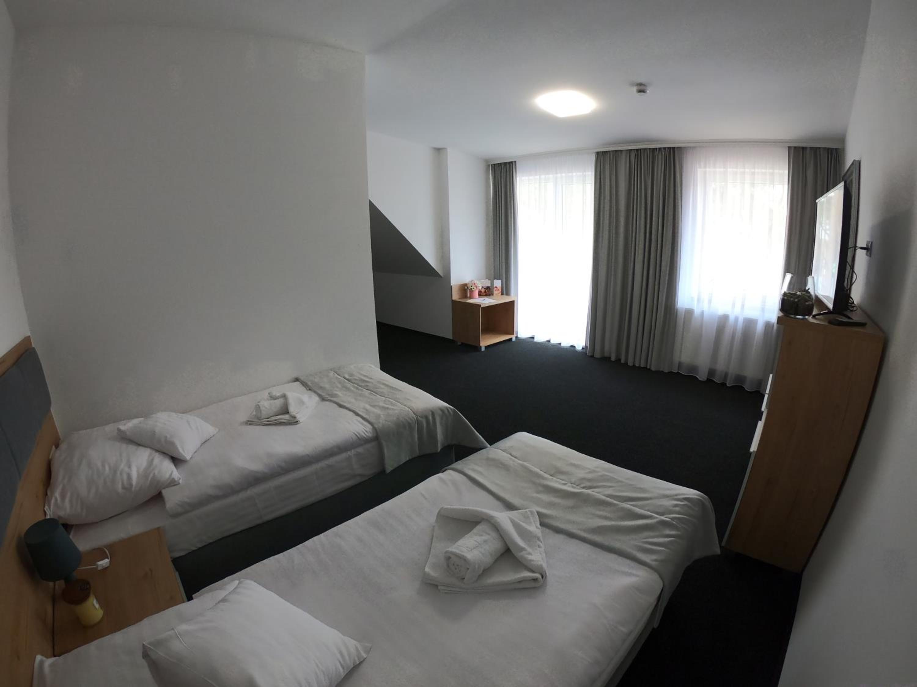 Deluxe Triple Room - Photo 7