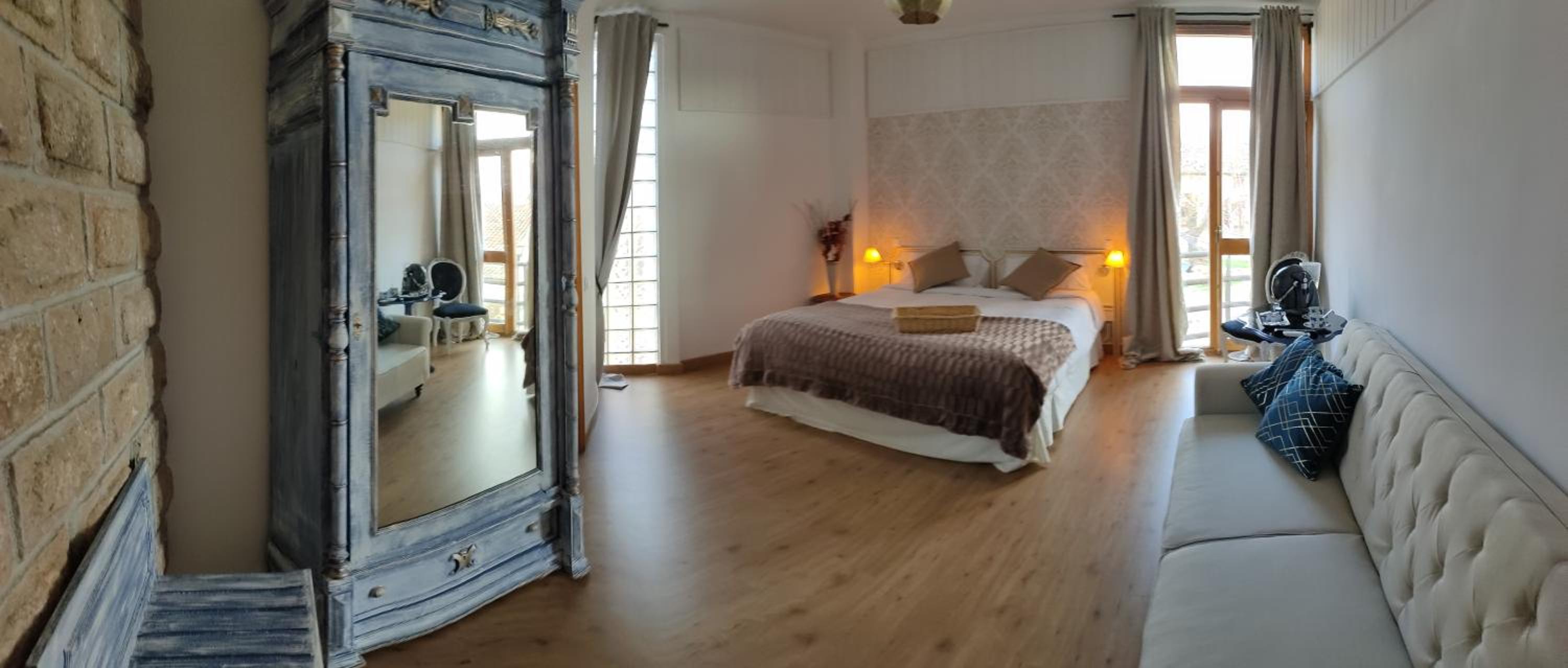 Habitación King con Balcón