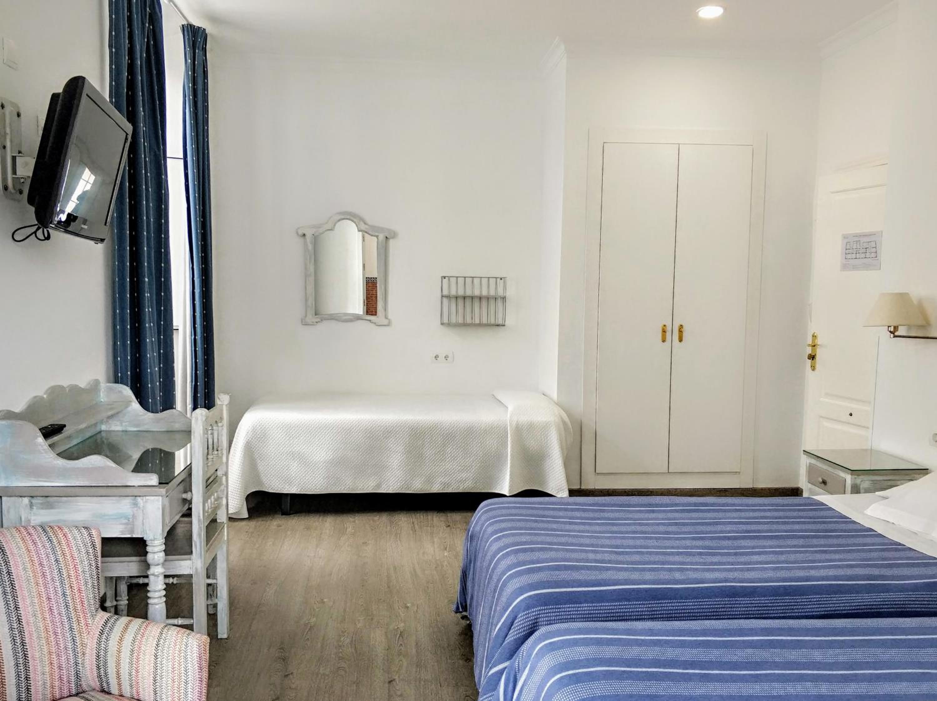 Habitación Triple con Balcón