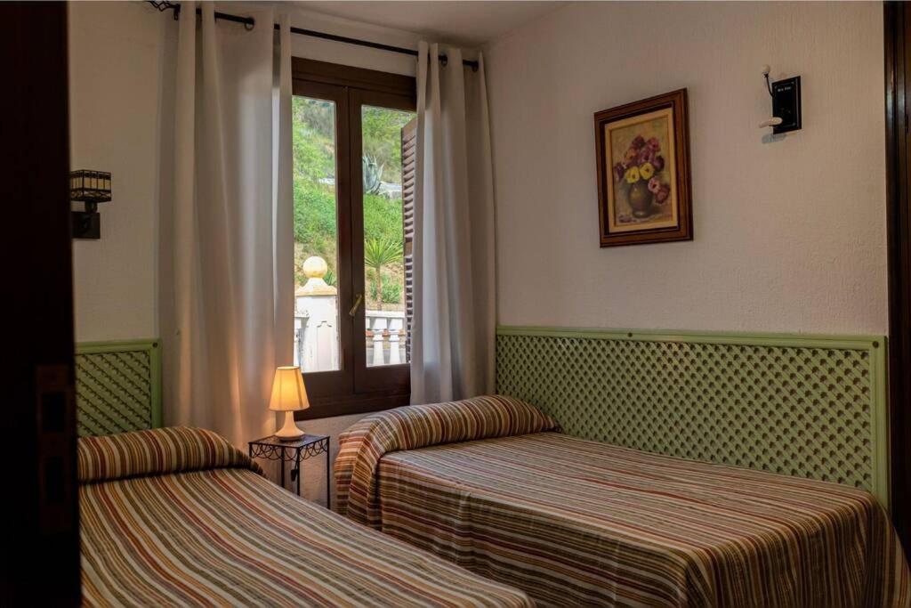 Casa de cuatro habitaciones