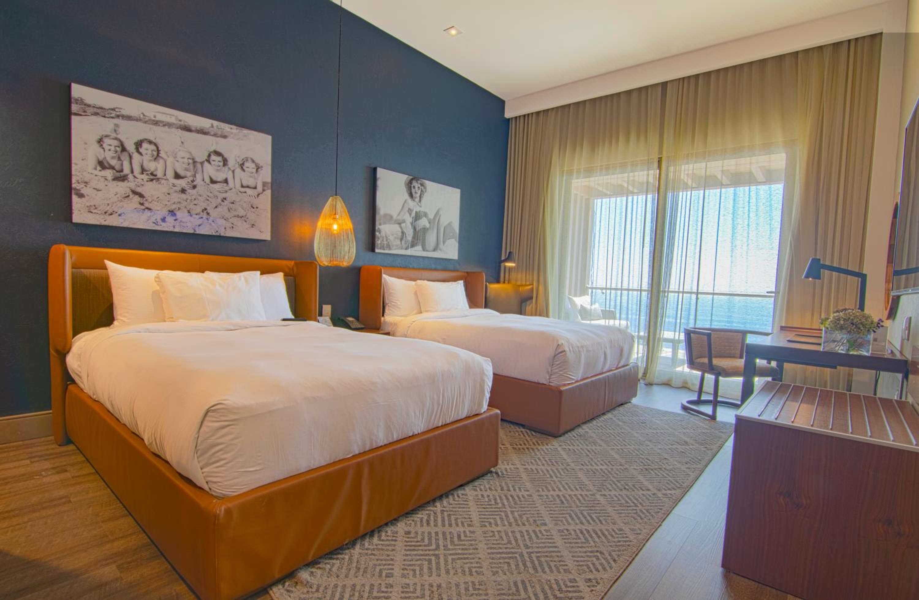 Premium Two Double Beds with Sea View photo 3