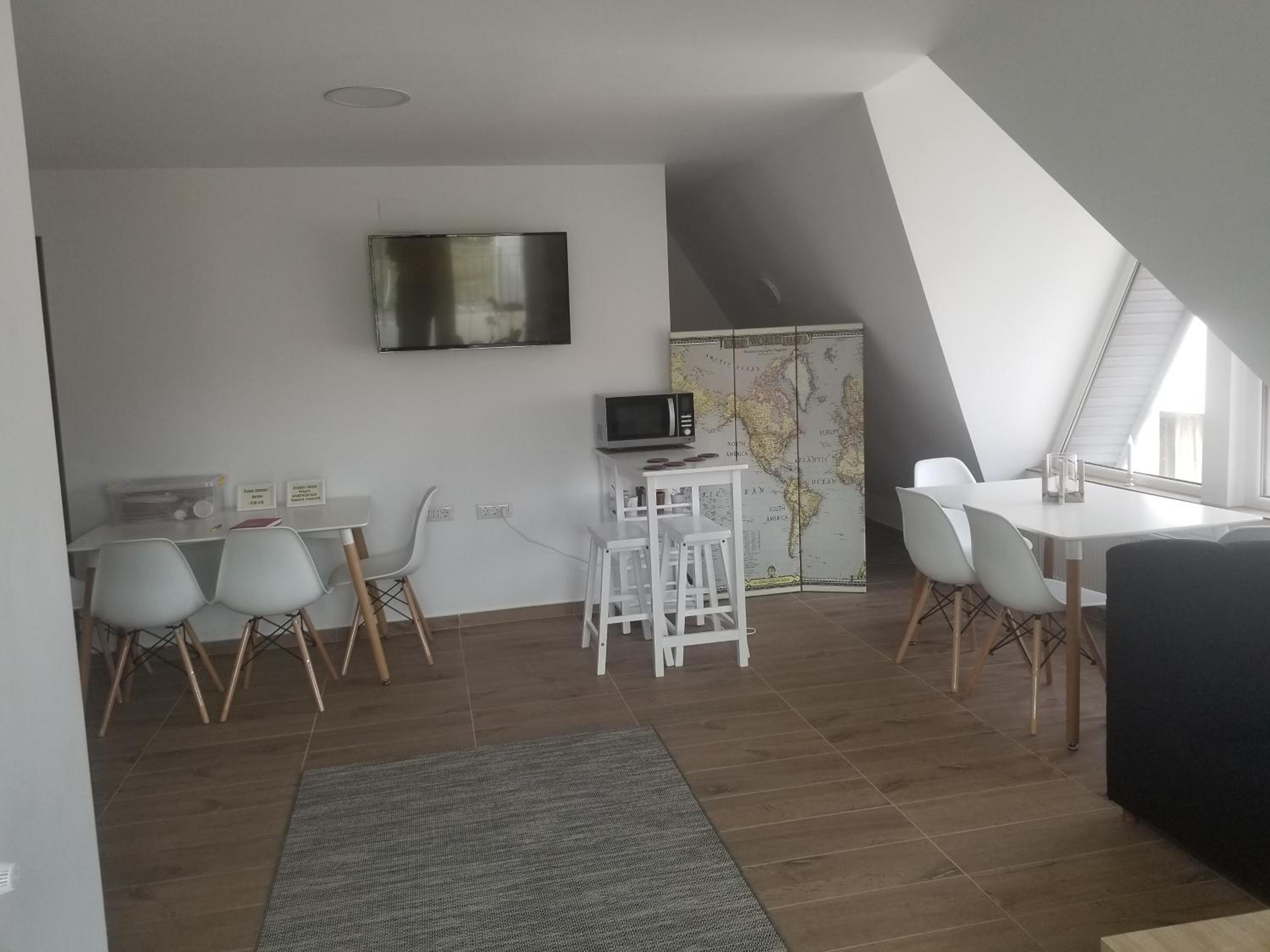 Three-Bedroom Apartment - Photo 32