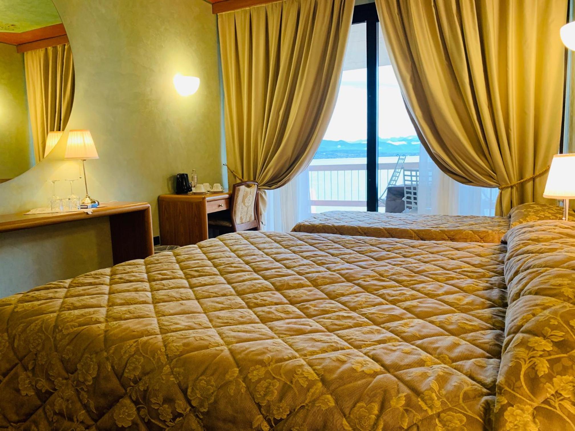 Superior Triple Room with Balcony and Lake View