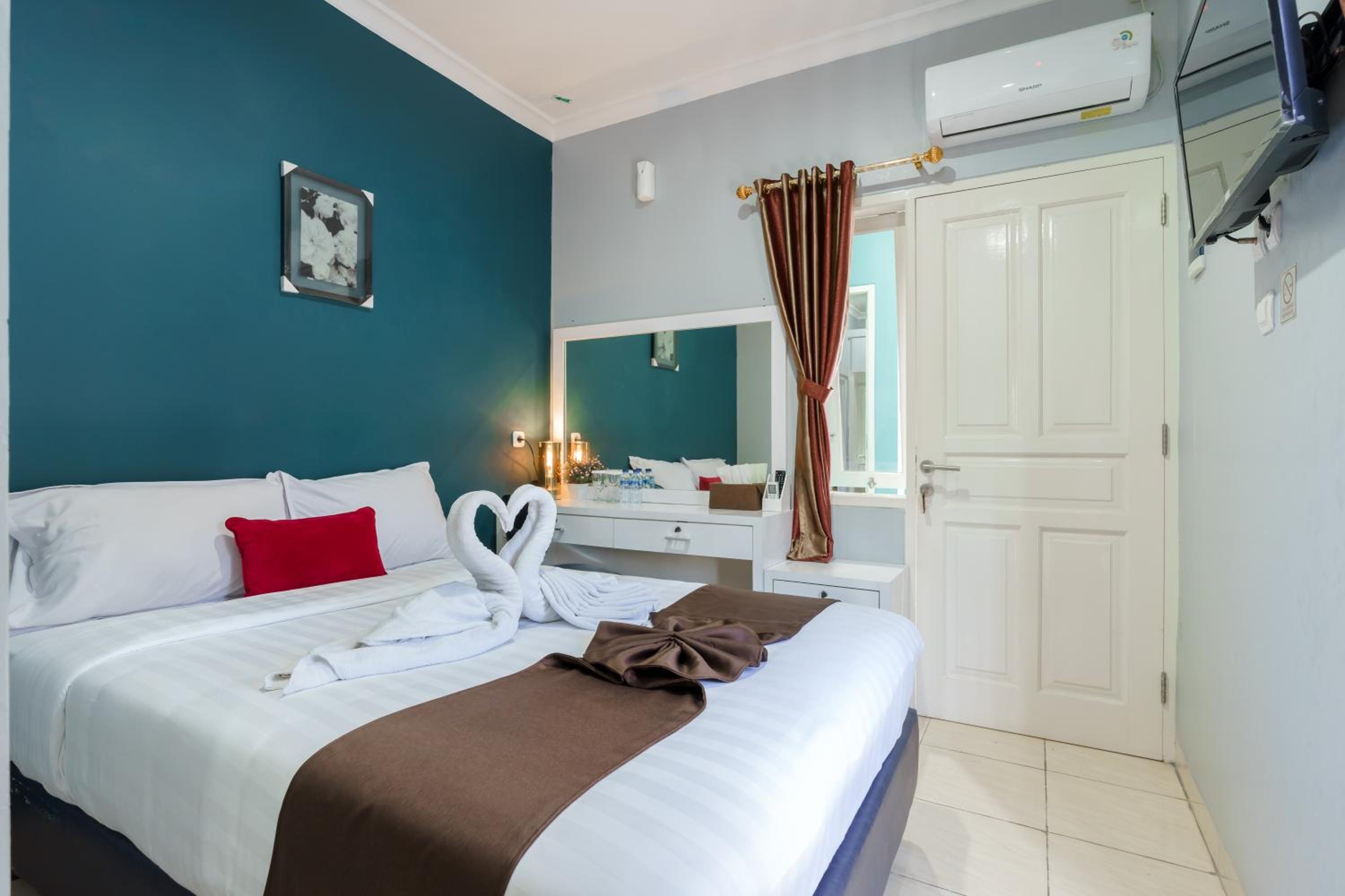 Deluxe Room - Photo 1