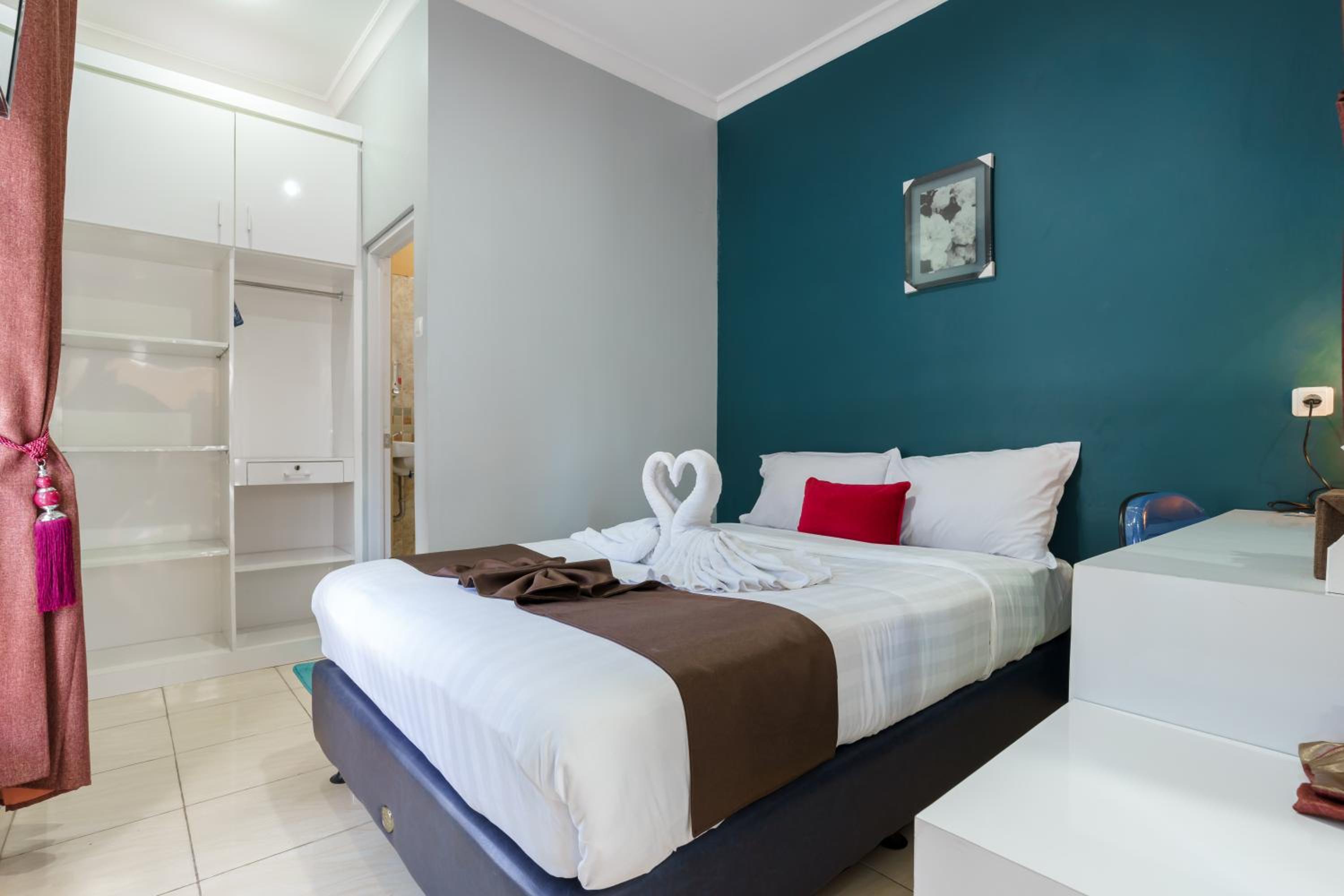 Deluxe Room - Photo 10