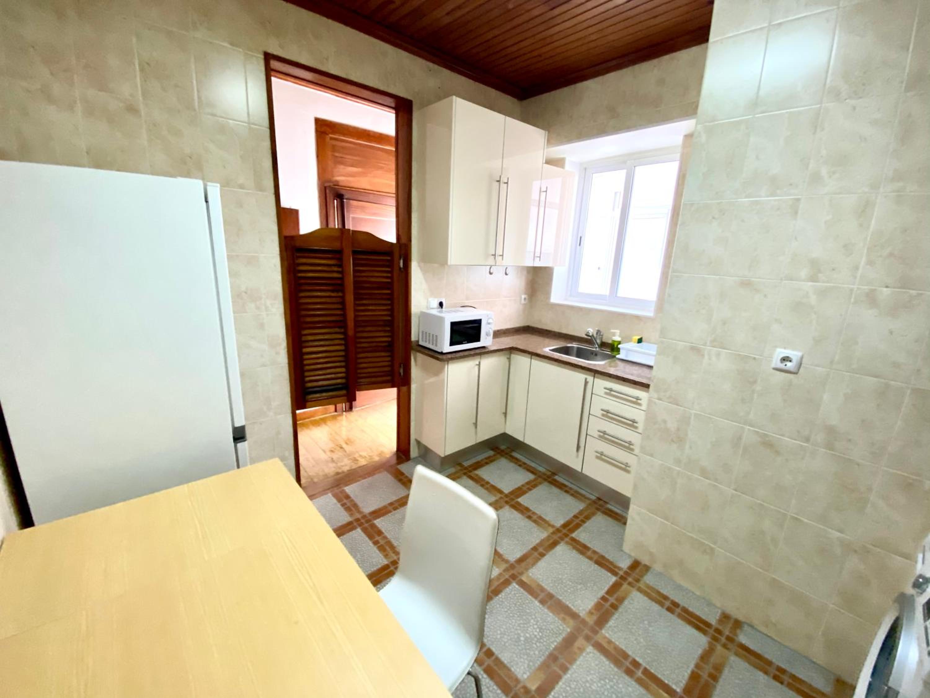 Three-Bedroom Apartment - Photo 50