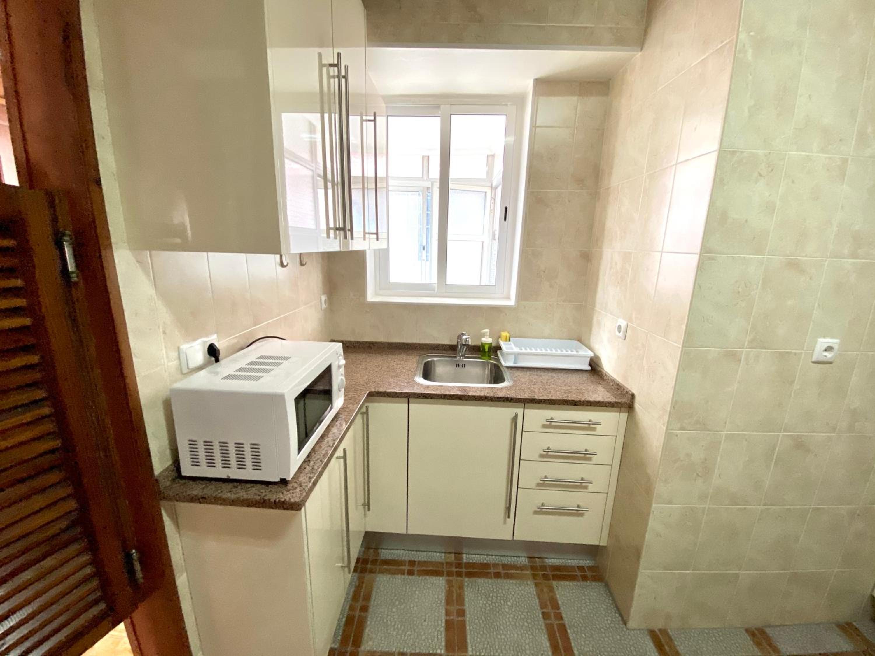 Three-Bedroom Apartment - Photo 48