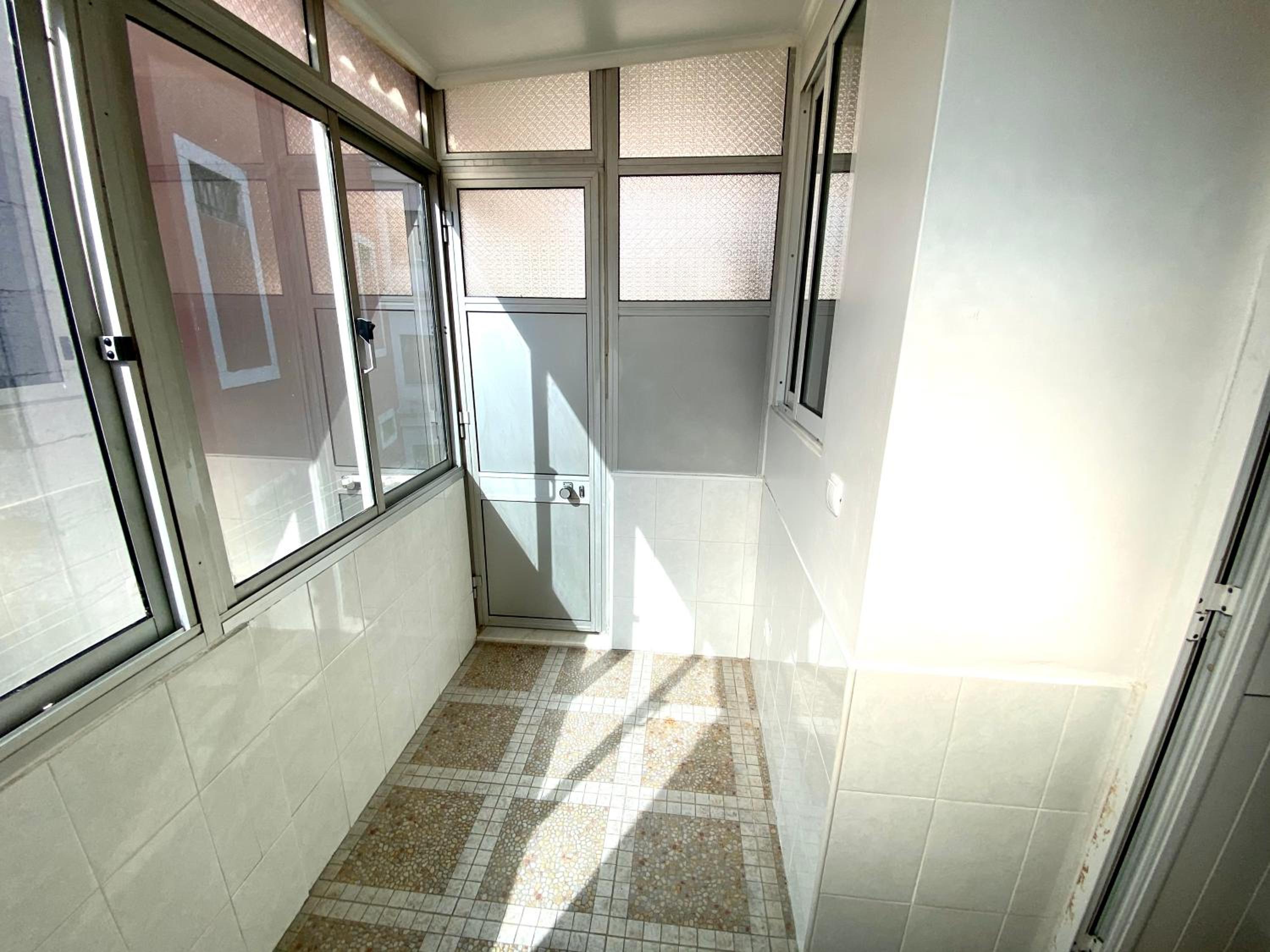Three-Bedroom Apartment - Photo 2