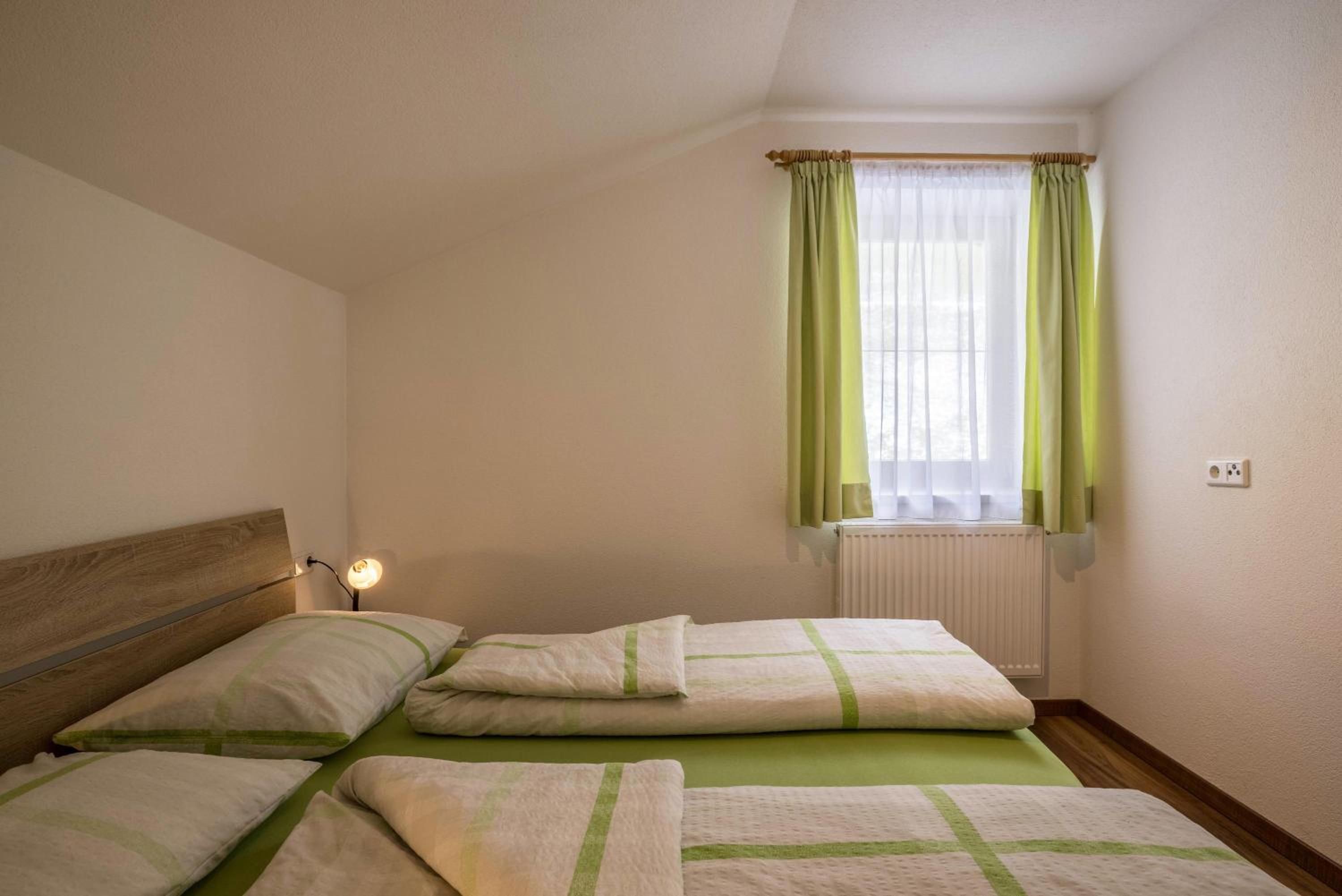 Two-Bedroom Deluxe Apartment with Garden View