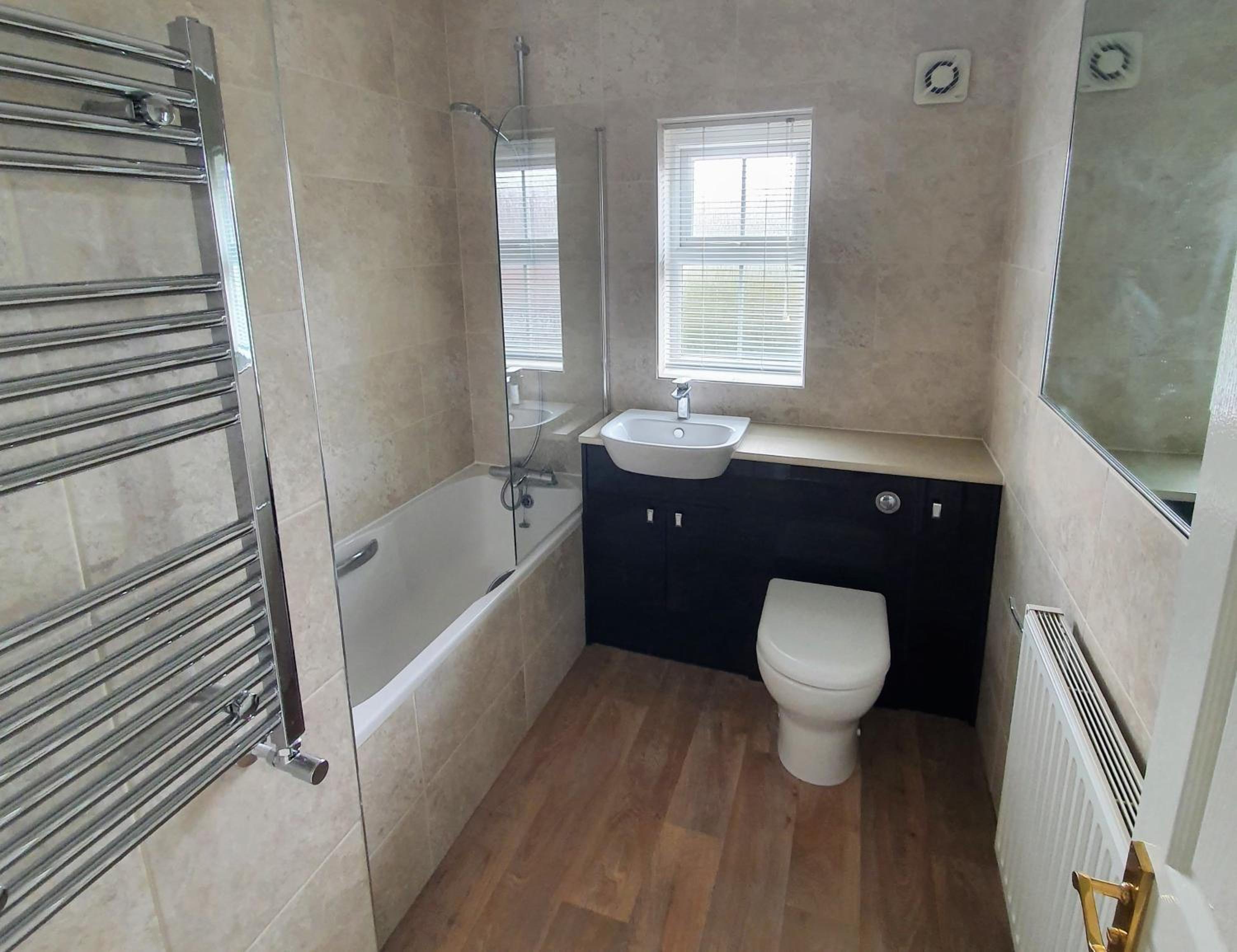 Three-Bedroom House - Photo 19