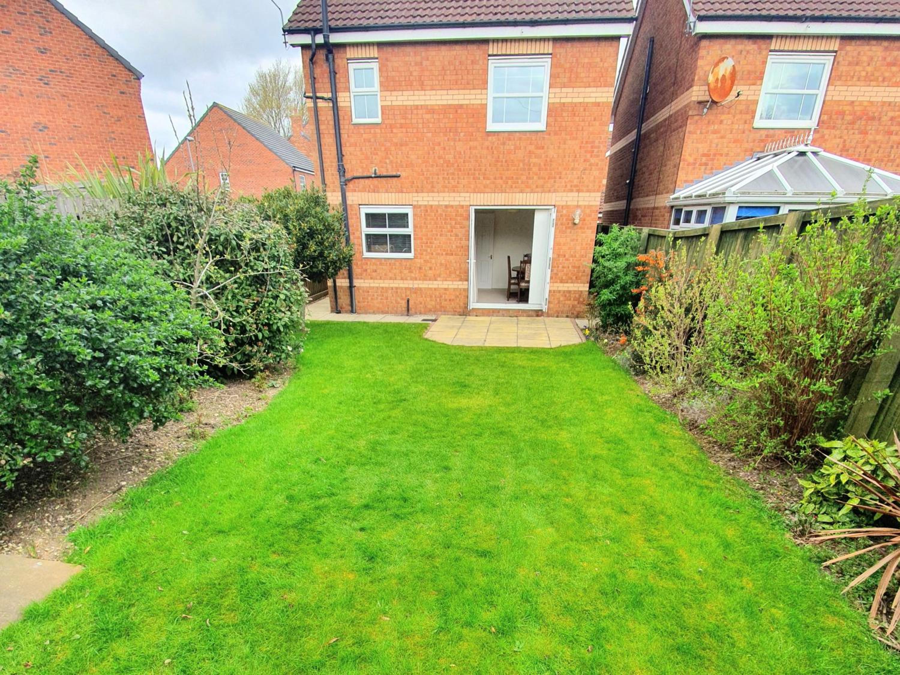 Three-Bedroom House - Photo 10