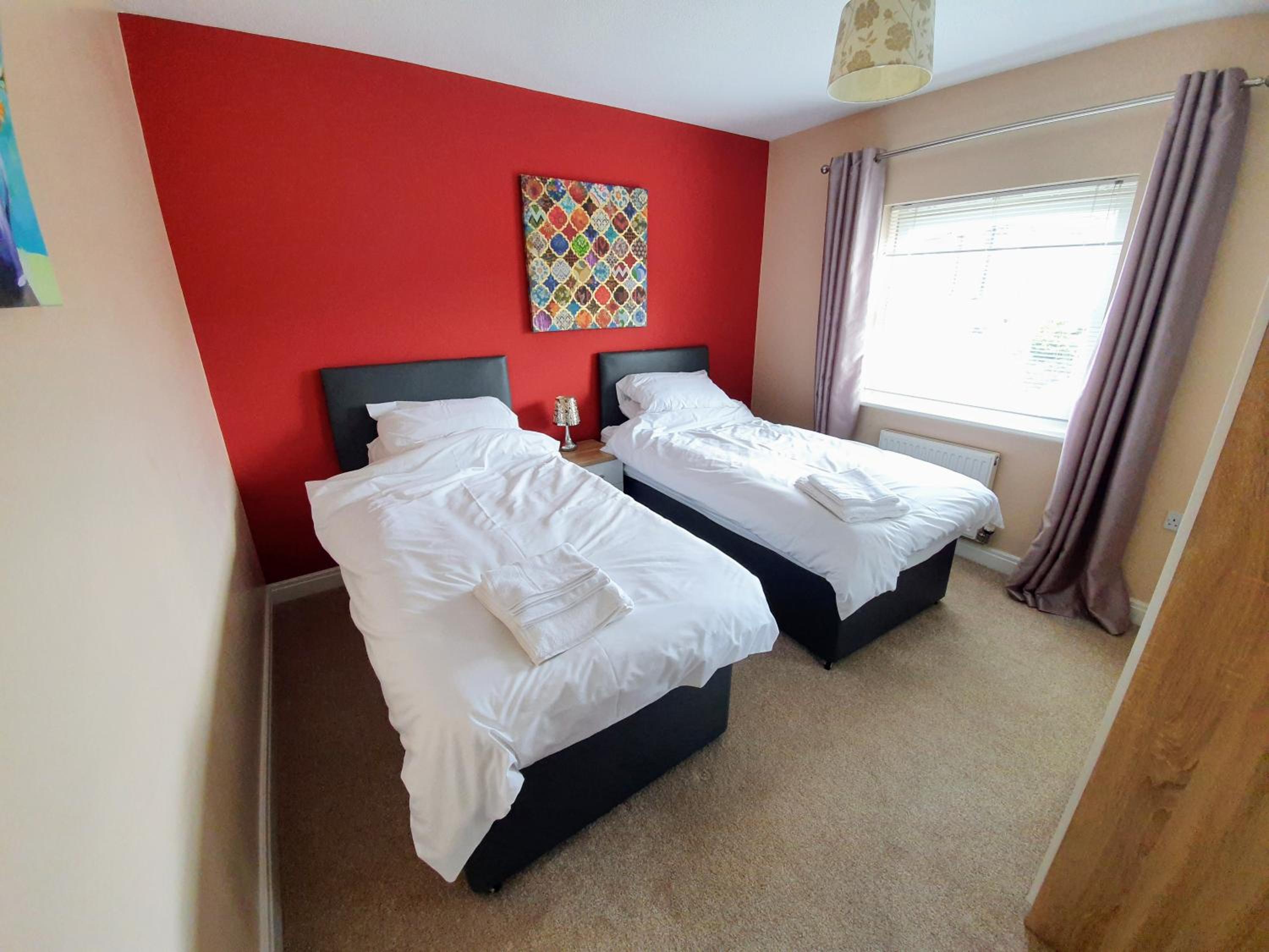 Three-Bedroom House - Photo 12