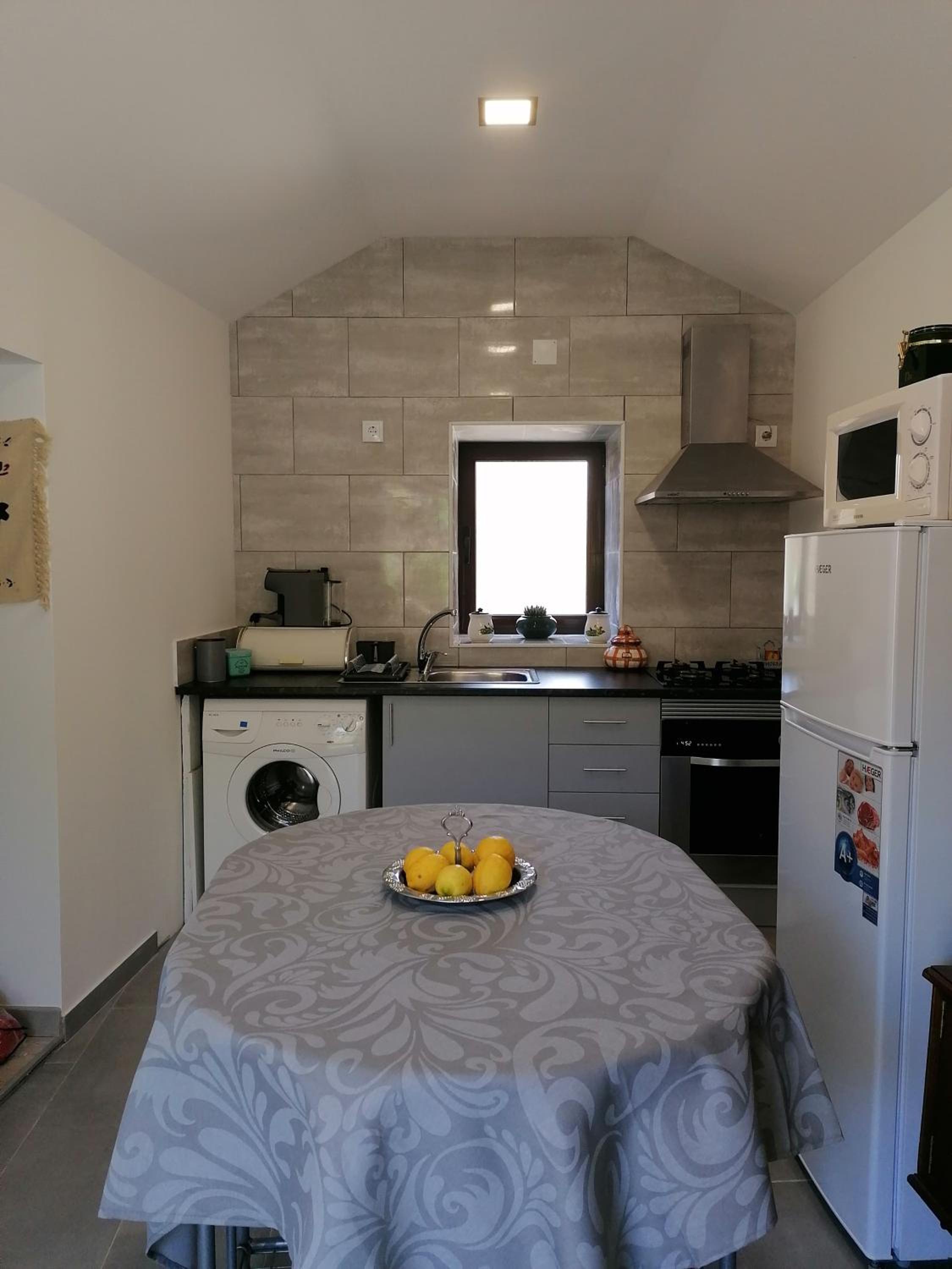 Three-Bedroom House - Photo 49