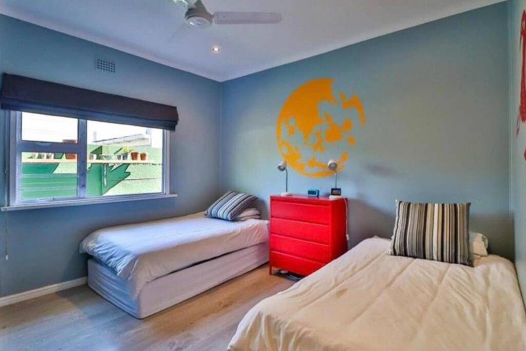 Four-Bedroom House - Photo 32