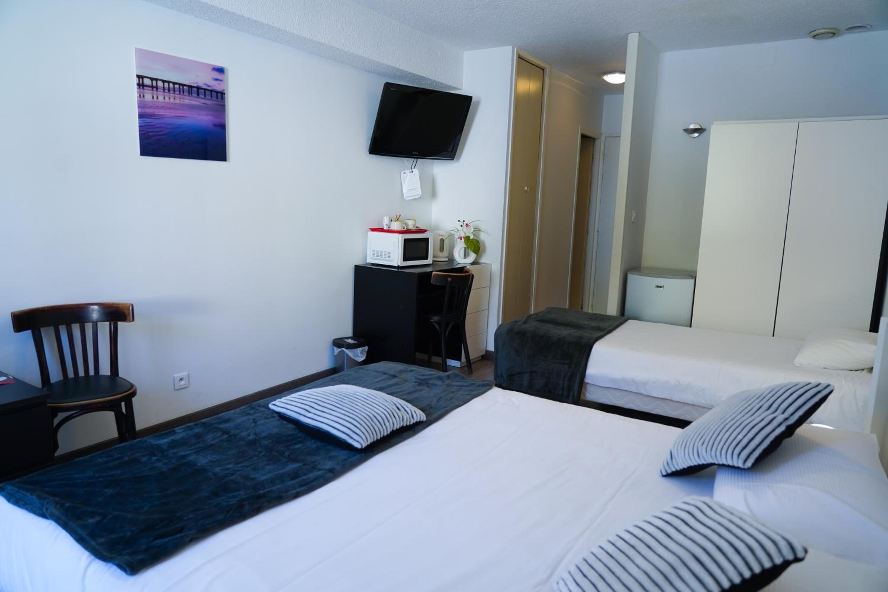 Triple Room - Photo 1
